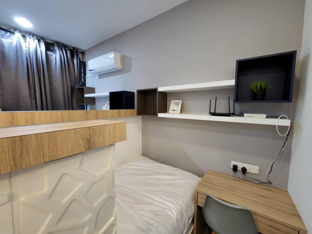 Studio with swimming pool access from the patio at Palazio Mount Austin IKEA AEON by GDRAGON HomeStay