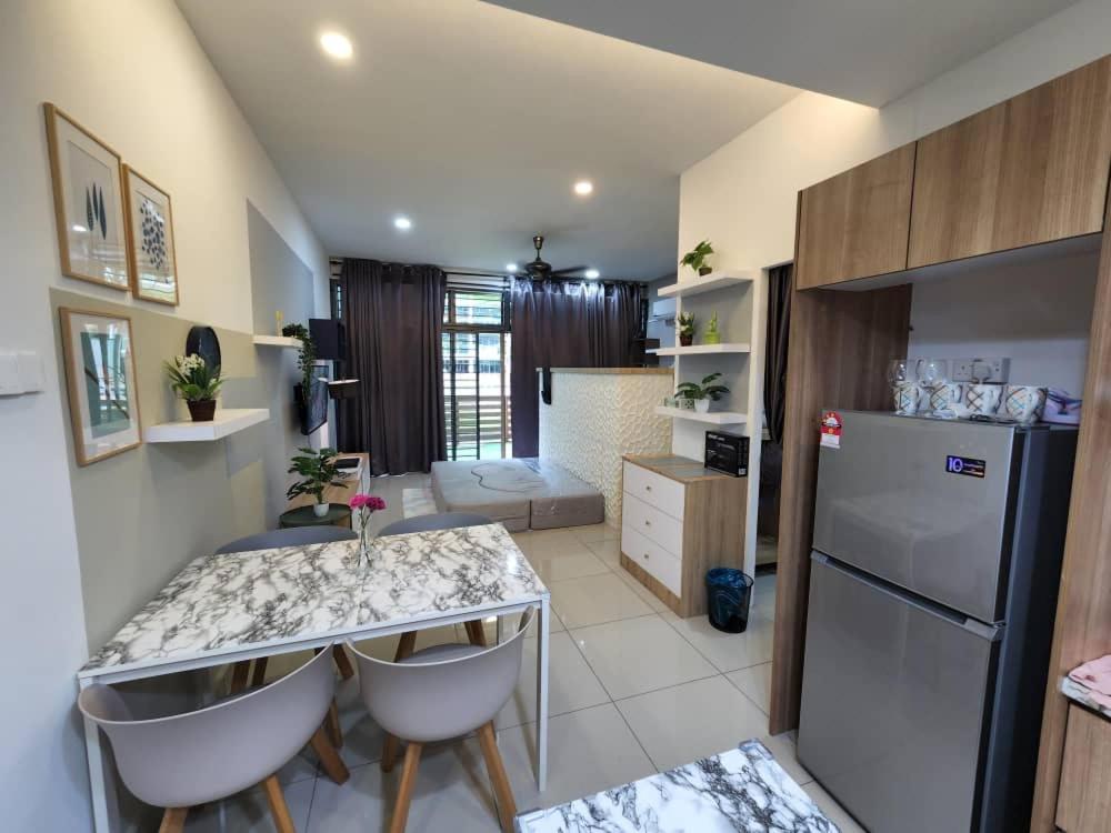 Studio with swimming pool access from the patio at Palazio Mount Austin IKEA AEON by GDRAGON HomeStay