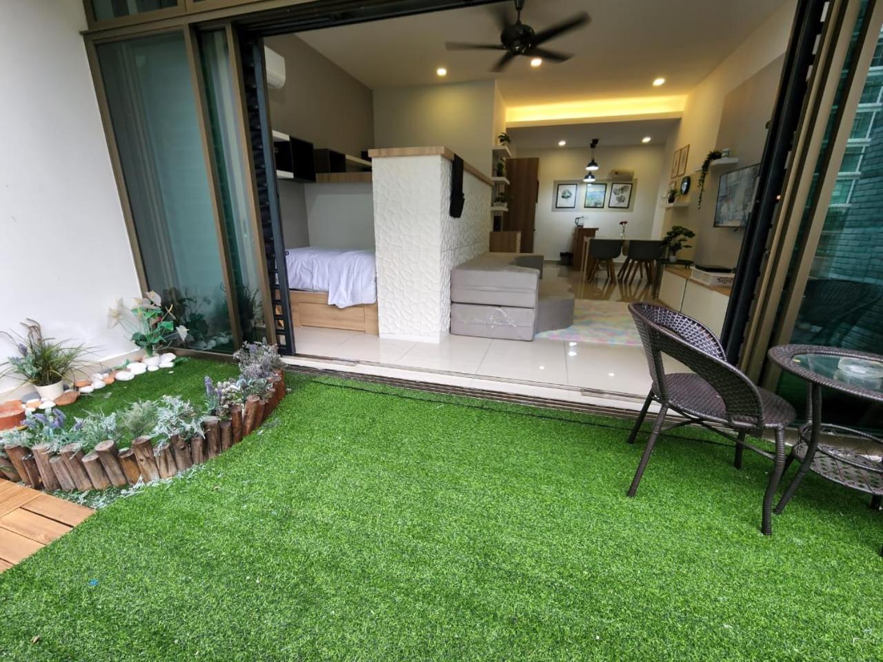 Studio with swimming pool access from the patio at Palazio Mount Austin IKEA AEON by GDRAGON HomeStay