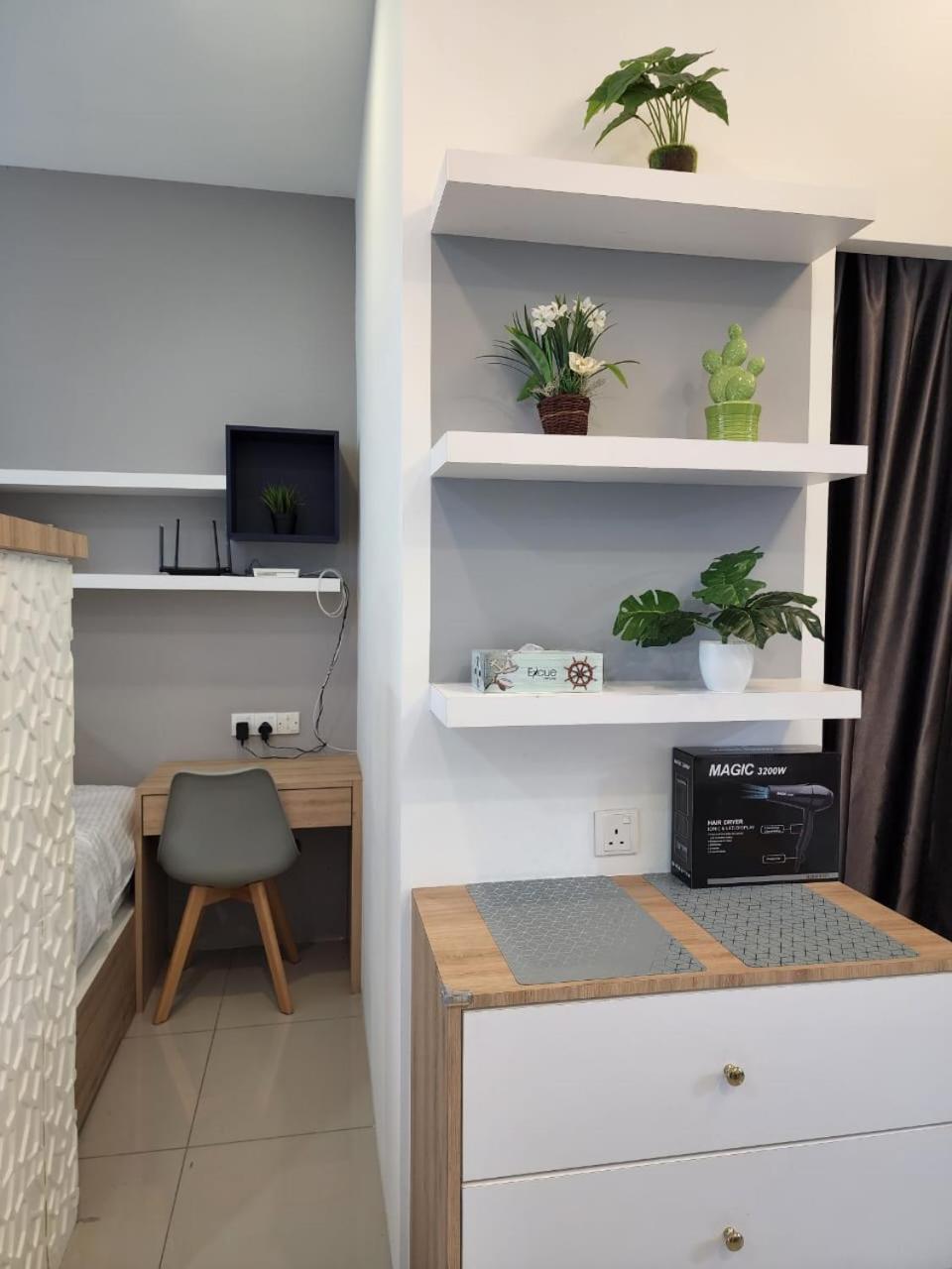 Studio with swimming pool access from the patio at Palazio Mount Austin IKEA AEON by GDRAGON HomeStay