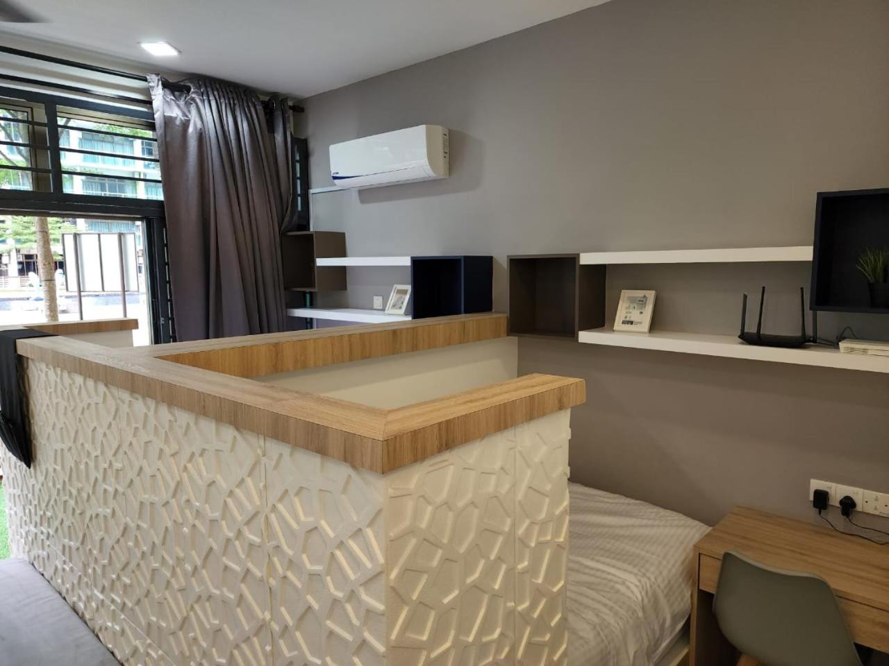 Studio with swimming pool access from the patio at Palazio Mount Austin IKEA AEON by GDRAGON HomeStay