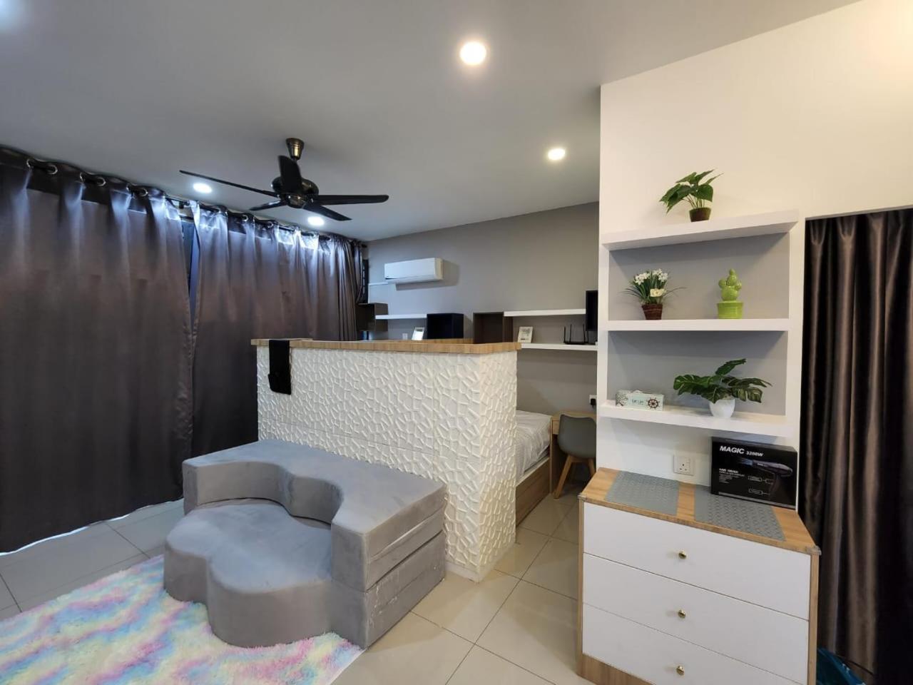 Studio with swimming pool access from the patio at Palazio Mount Austin IKEA AEON by GDRAGON HomeStay