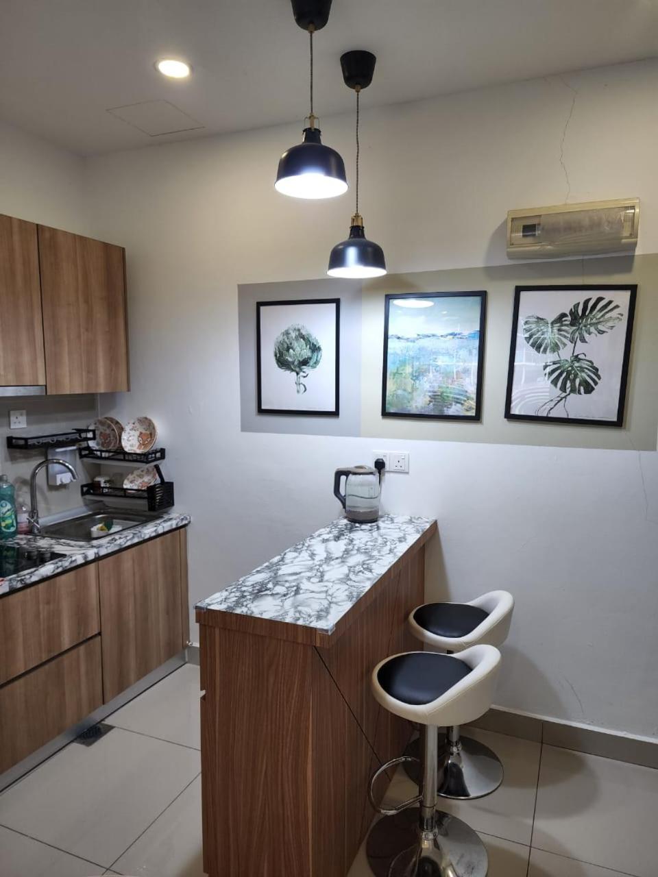 Studio with swimming pool access from the patio at Palazio Mount Austin IKEA AEON by GDRAGON HomeStay