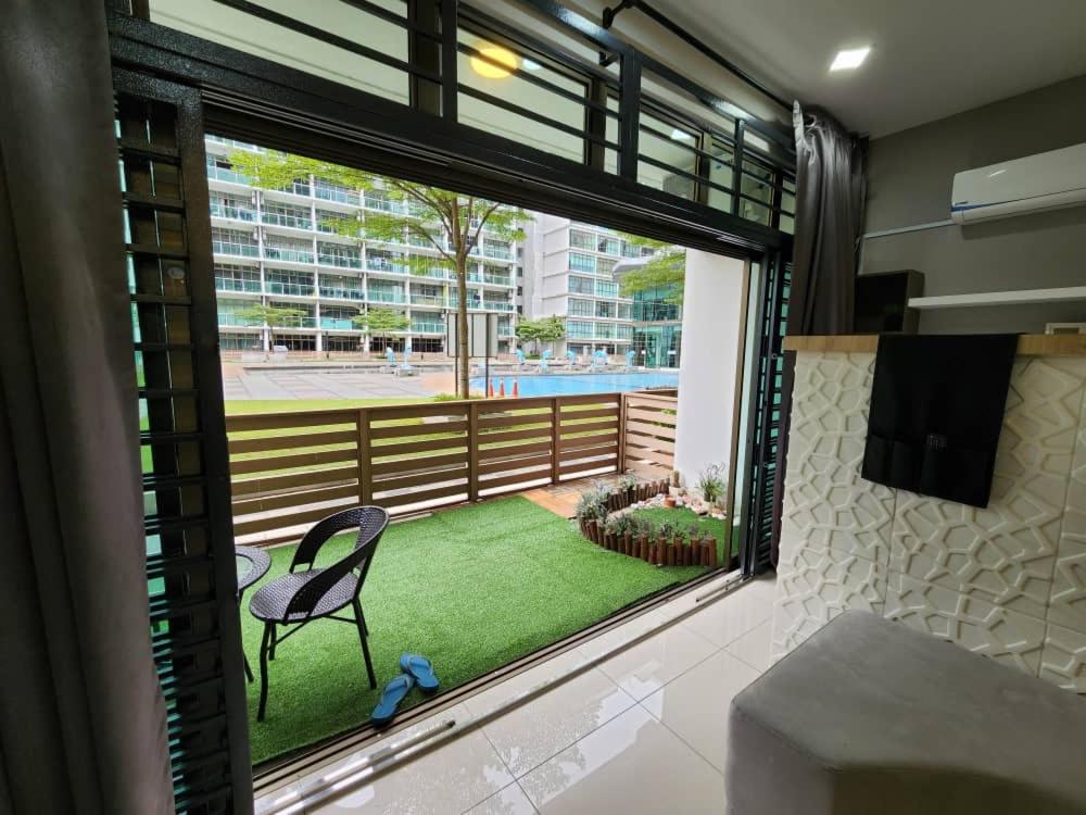 Studio with swimming pool access from the patio at Palazio Mount Austin IKEA AEON by GDRAGON HomeStay
