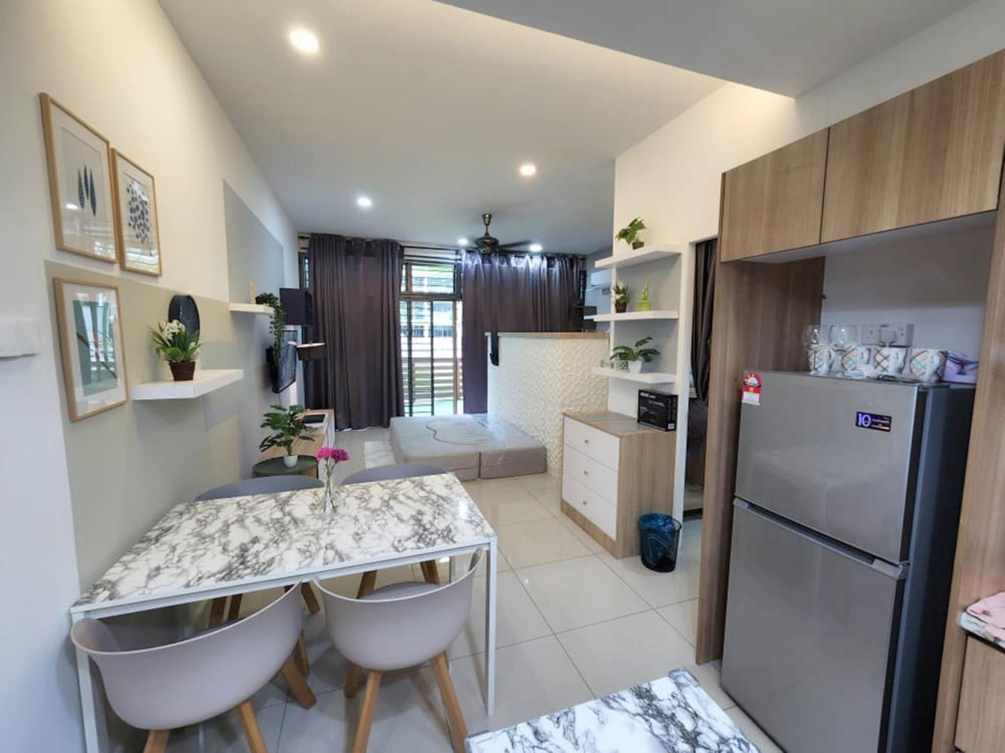 Studio with swimming pool access from the patio at Palazio Mount Austin IKEA AEON by GDRAGON HomeStay