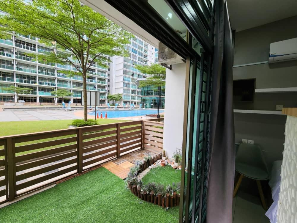 Studio with swimming pool access from the patio at Palazio Mount Austin IKEA AEON by GDRAGON HomeStay