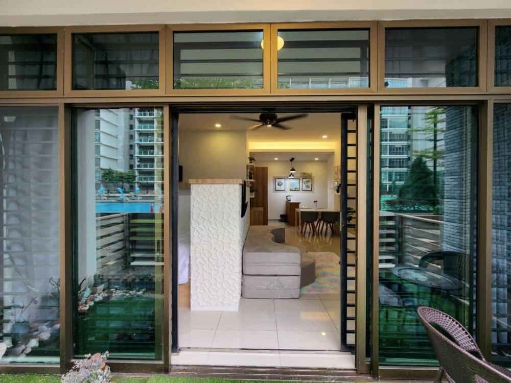 Studio with swimming pool access from the patio at Palazio Mount Austin IKEA AEON by GDRAGON HomeStay