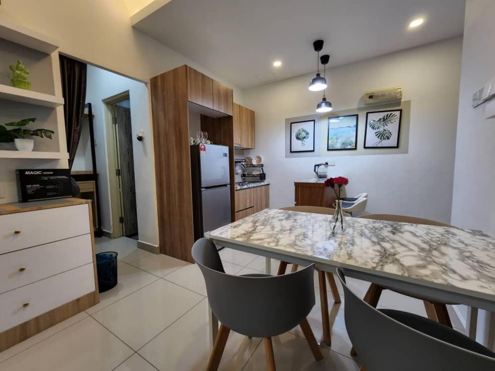 Studio with swimming pool access from the patio at Palazio Mount Austin IKEA AEON by GDRAGON HomeStay