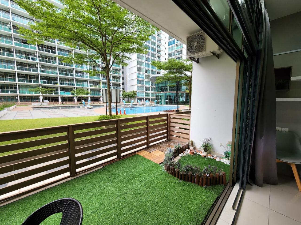Studio with swimming pool access from the patio at Palazio Mount Austin IKEA AEON by GDRAGON HomeStay