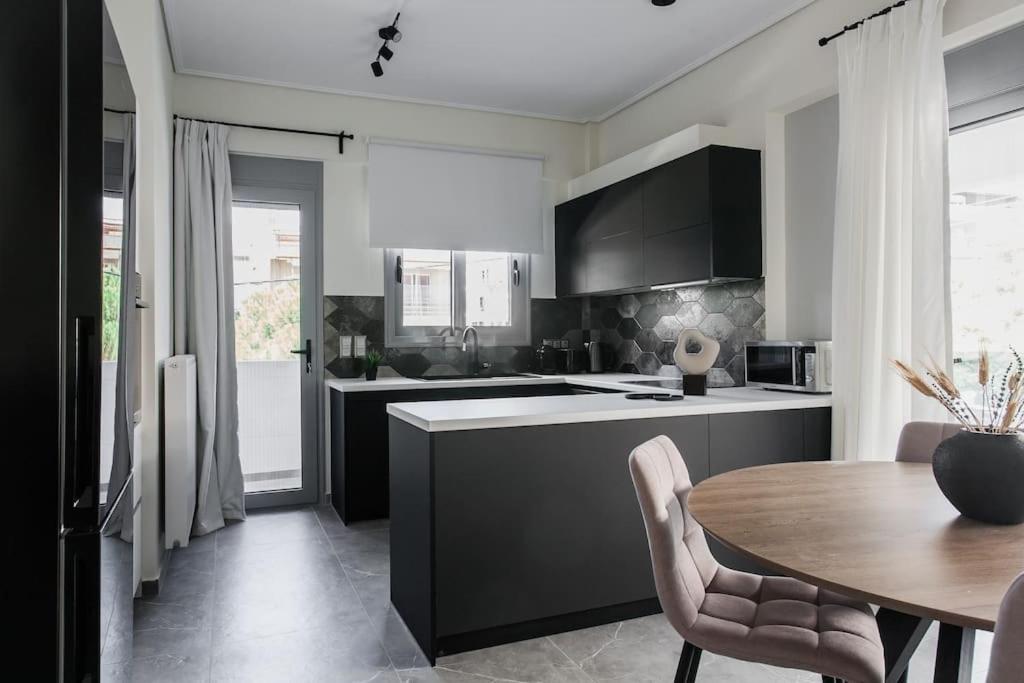 Teal Faliro House by UPSTREET