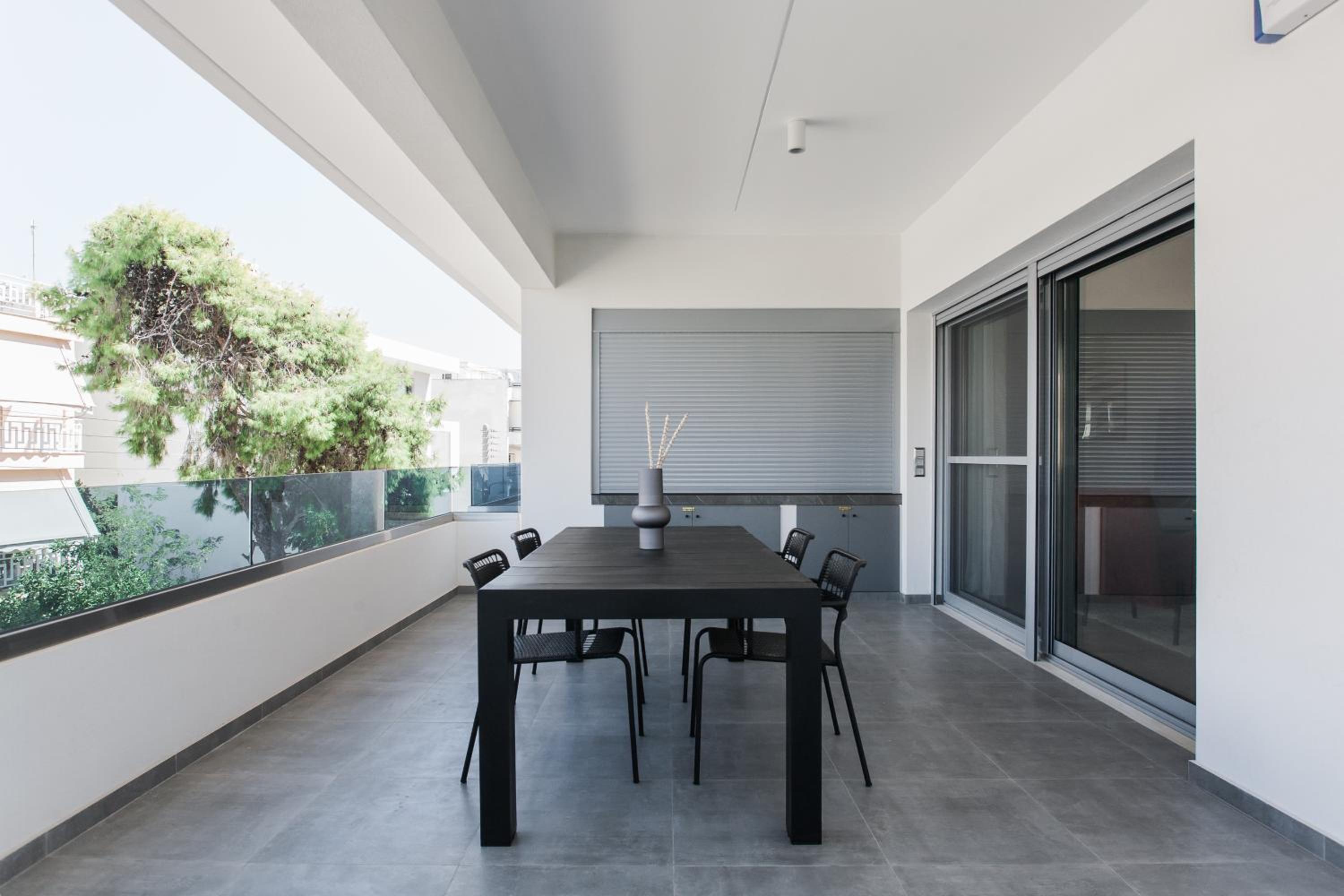 Teal Faliro House by UPSTREET