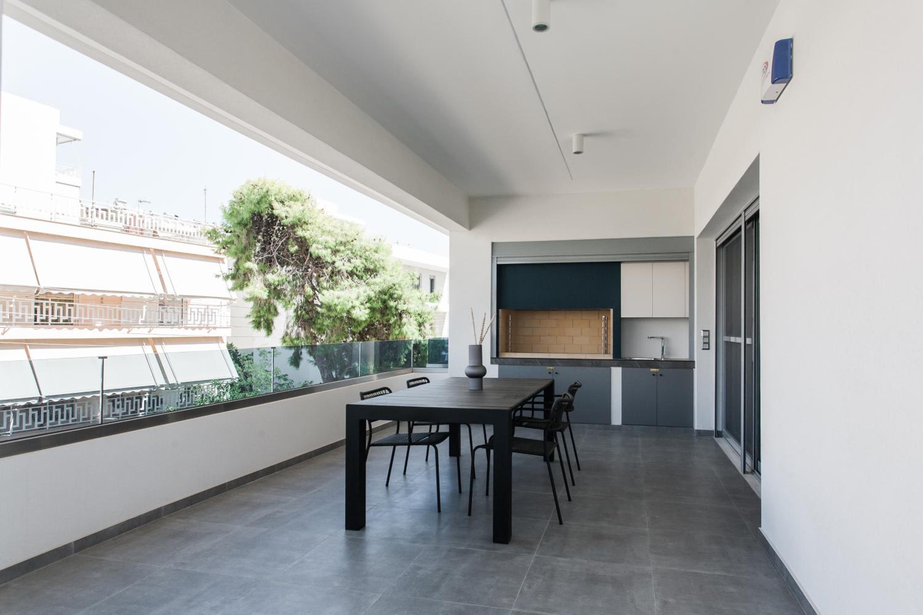Teal Faliro House by UPSTREET