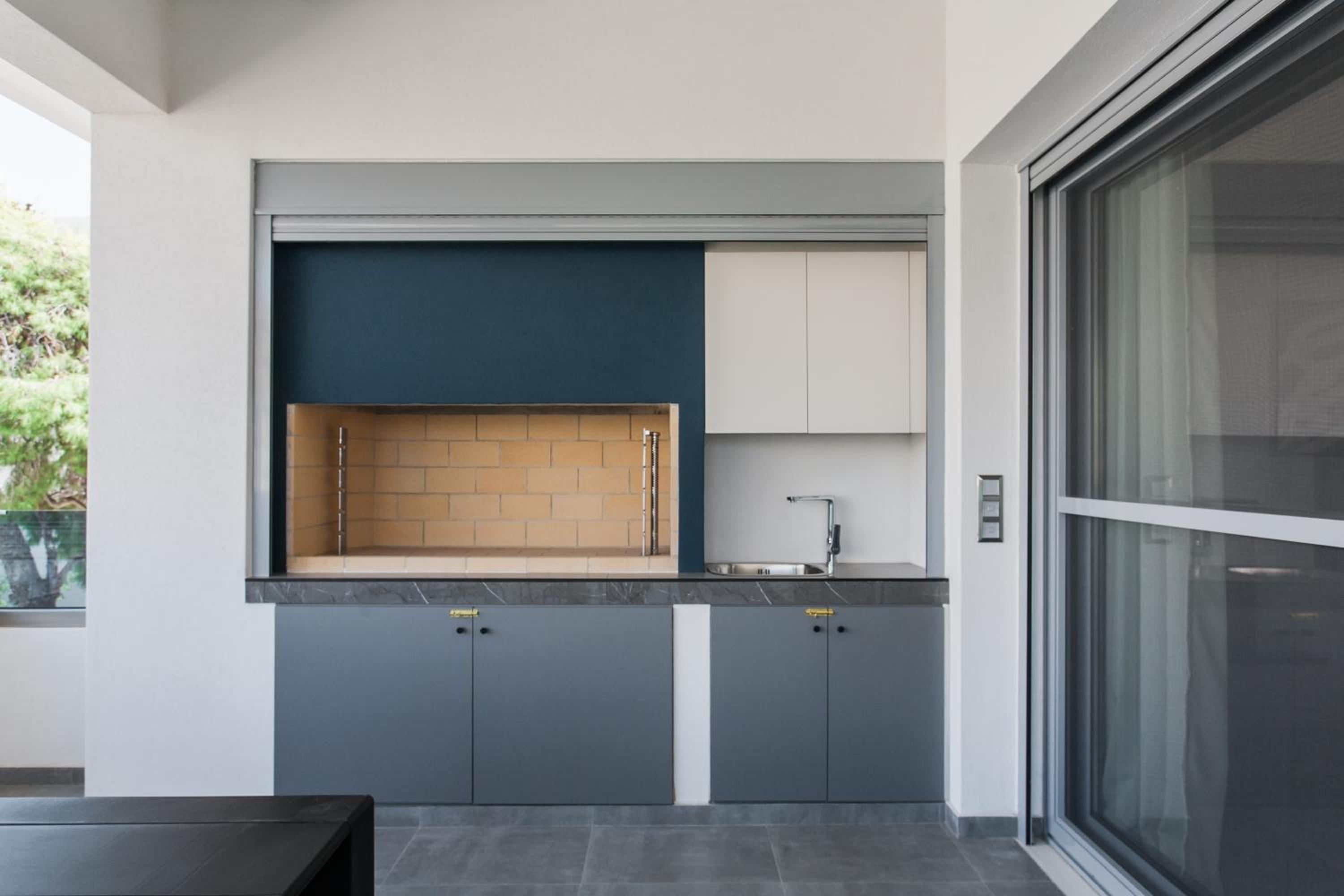 Teal Faliro House by UPSTREET