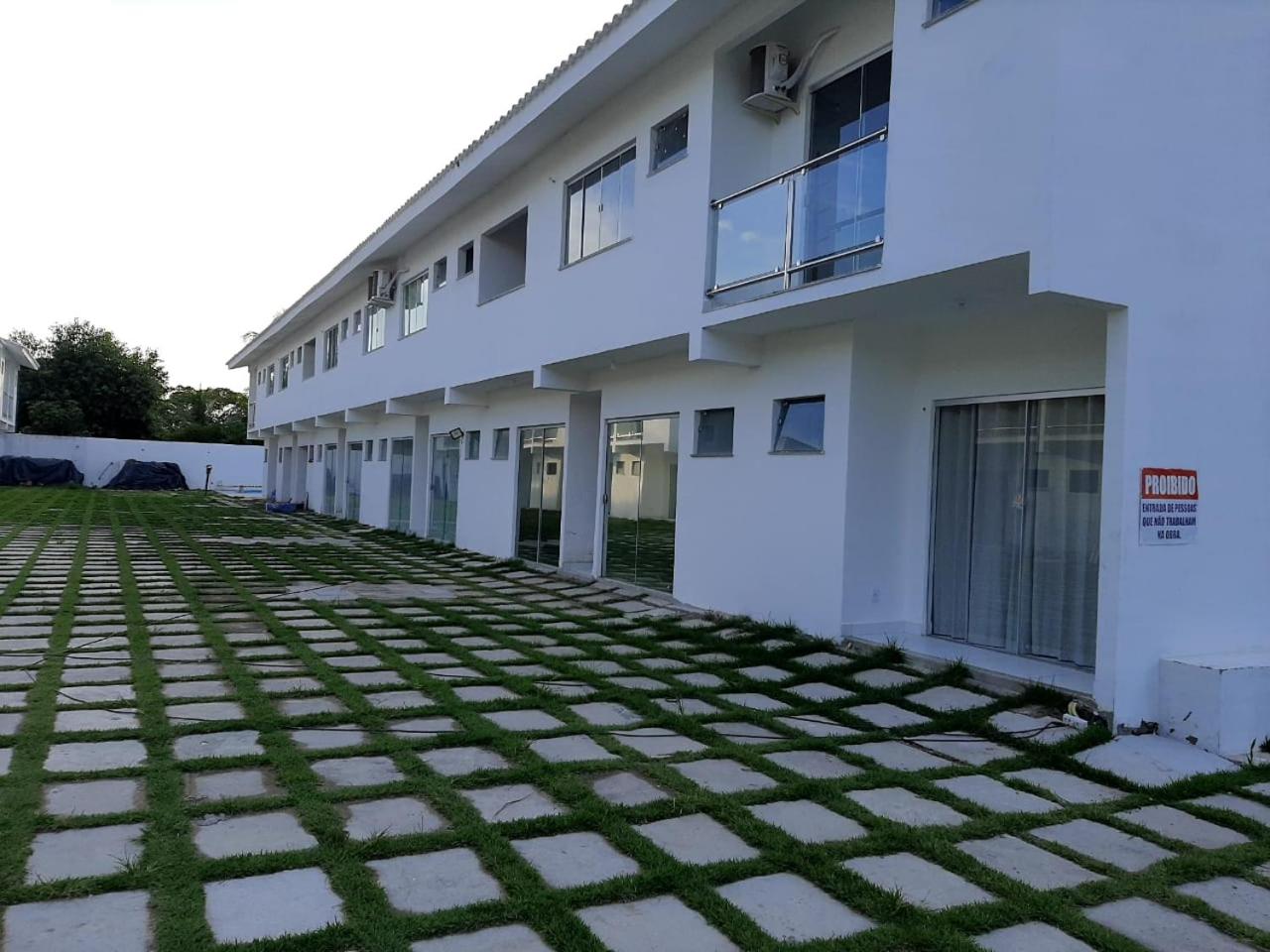 Casa para temporada 50m da praia em Condomínio 2 Suítes Ar Wi-Fi Rápida Ideal para Família