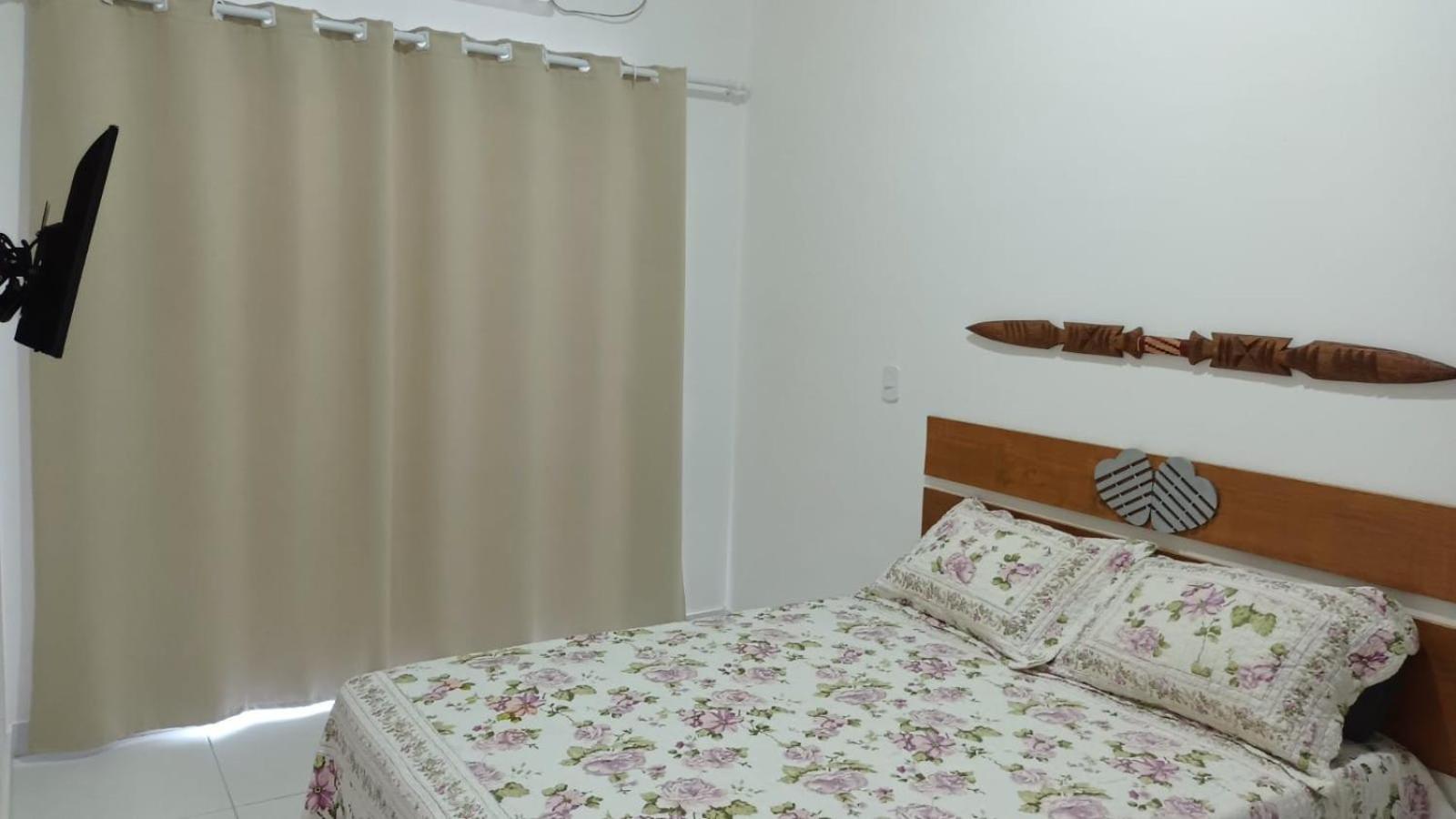 Casa para temporada 50m da praia em Condomínio 2 Suítes Ar Wi-Fi Rápida Ideal para Família