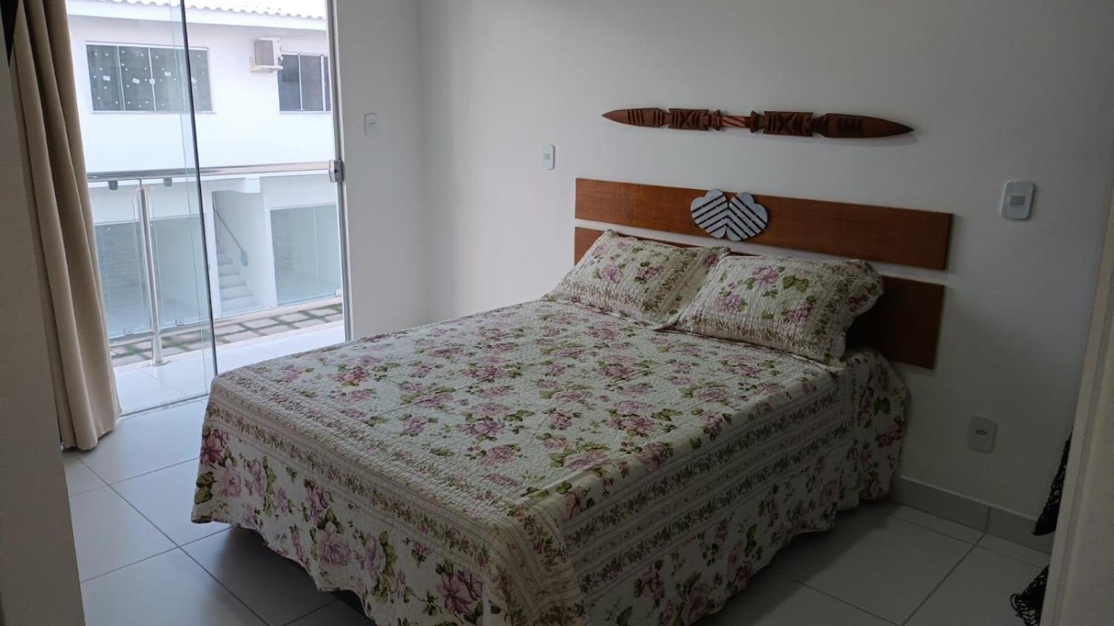 Casa para temporada 50m da praia em Condomínio 2 Suítes Ar Wi-Fi Rápida Ideal para Família