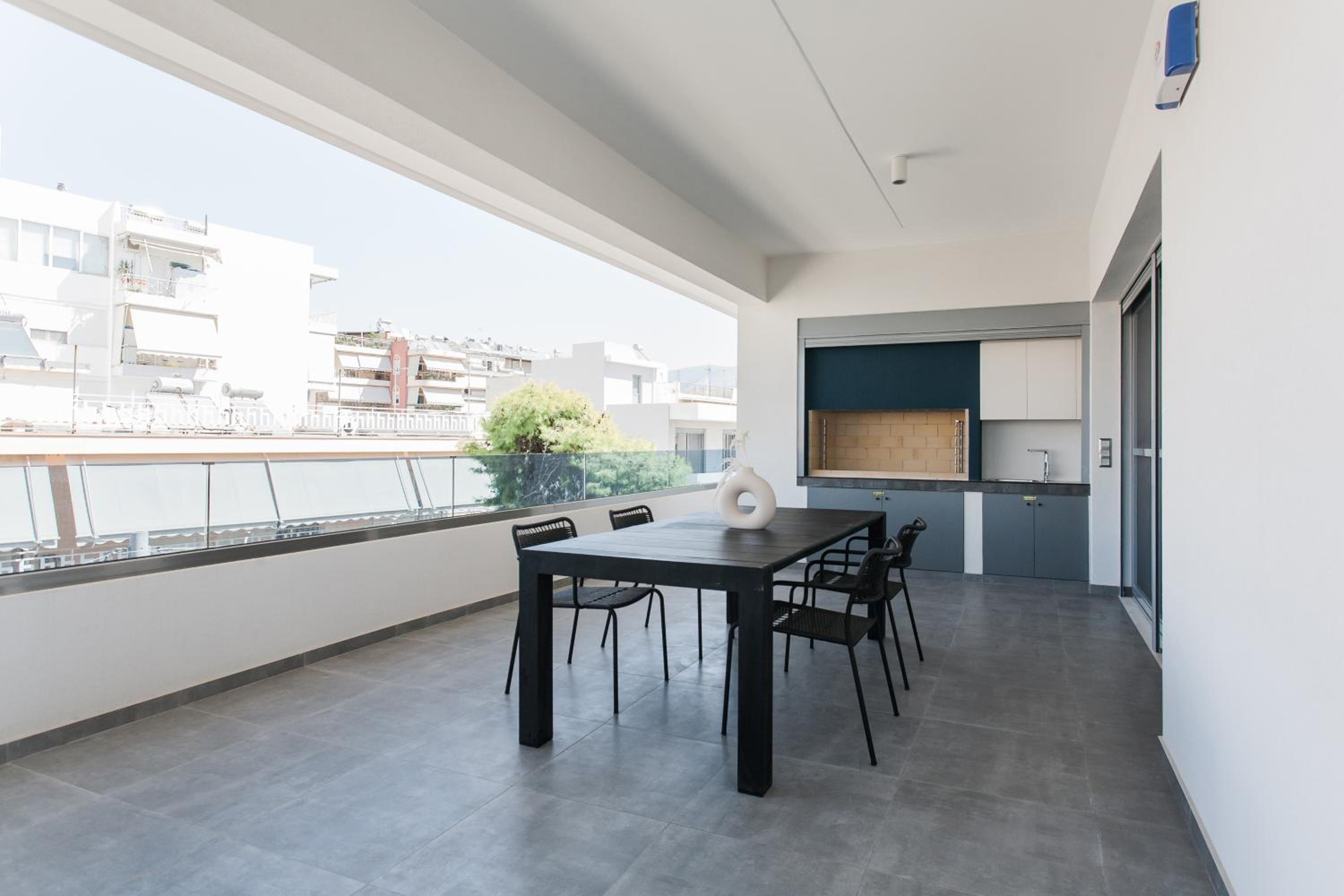 Teal Faliro House by UPSTREET
