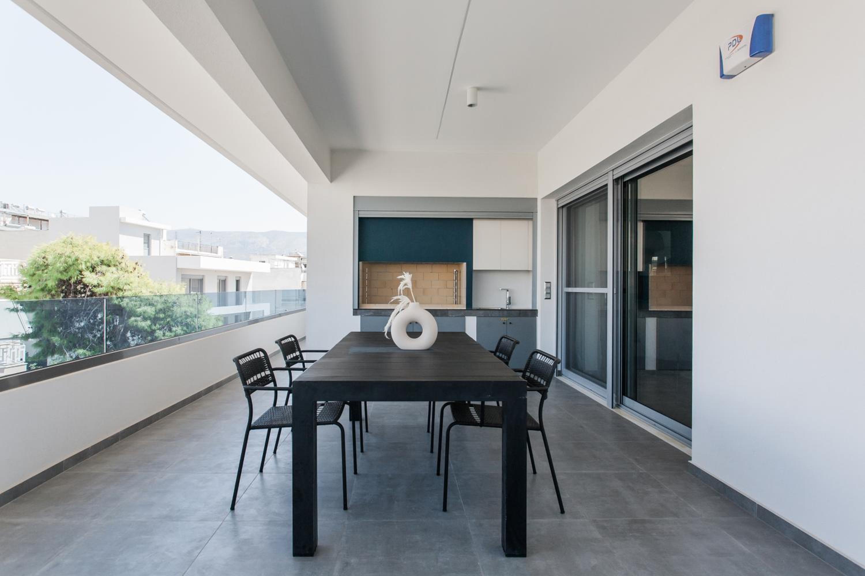 Teal Faliro House by UPSTREET
