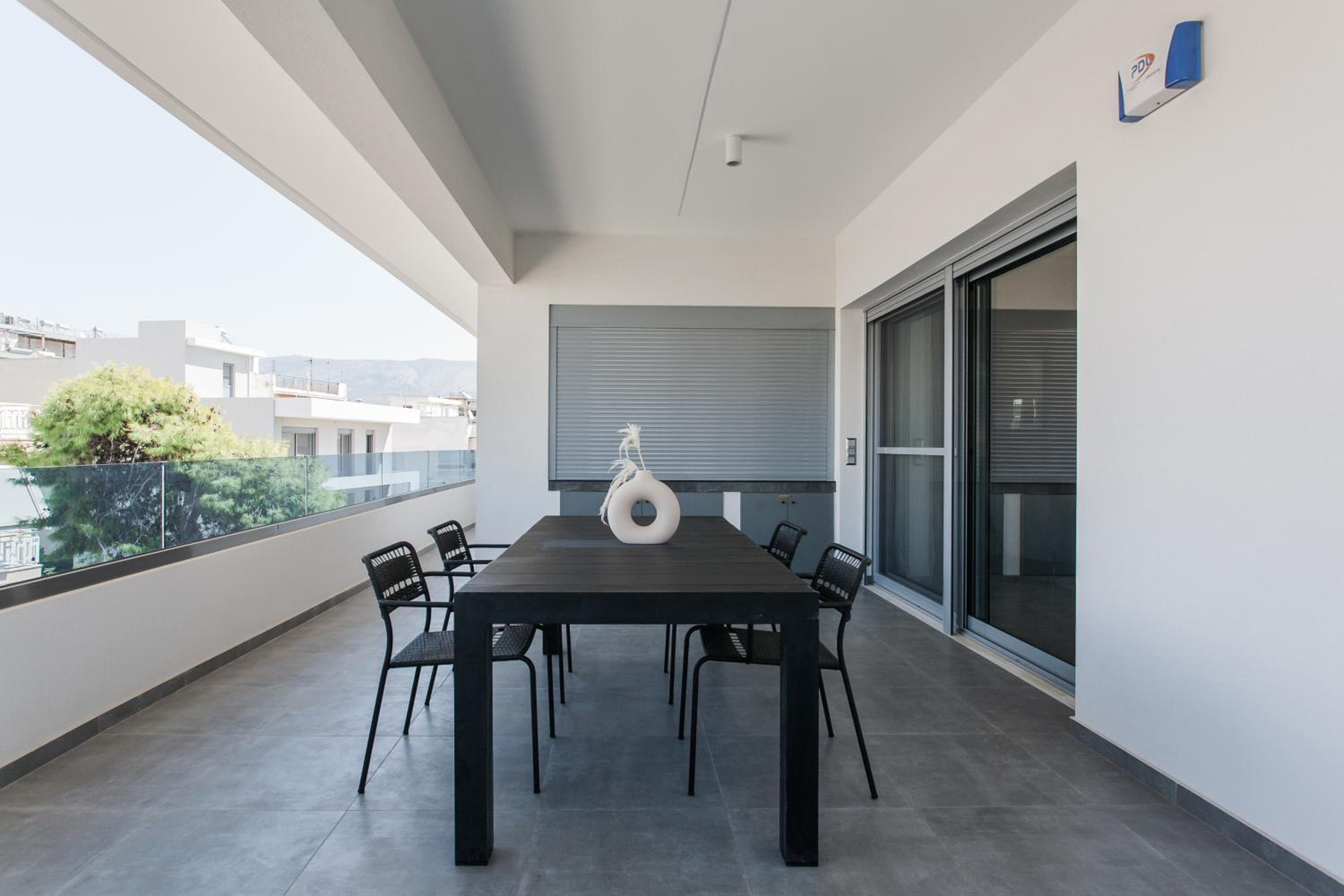 Teal Faliro House by UPSTREET