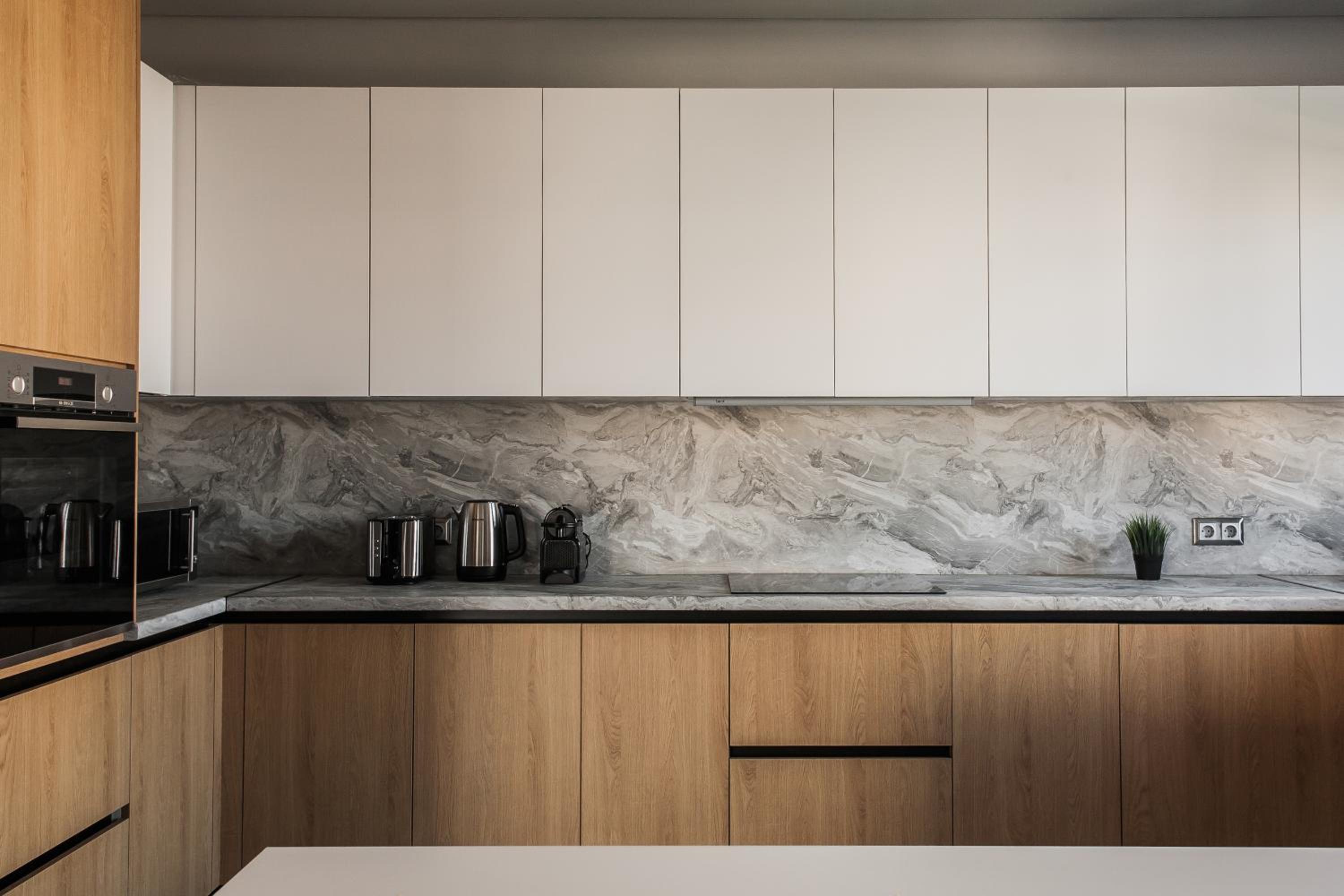 Teal Faliro House by UPSTREET