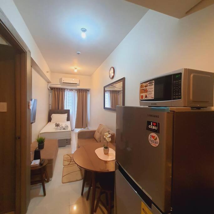 SMDC Coast Residences Lovely Fully-furnished 1 BR Condo with pool view 2