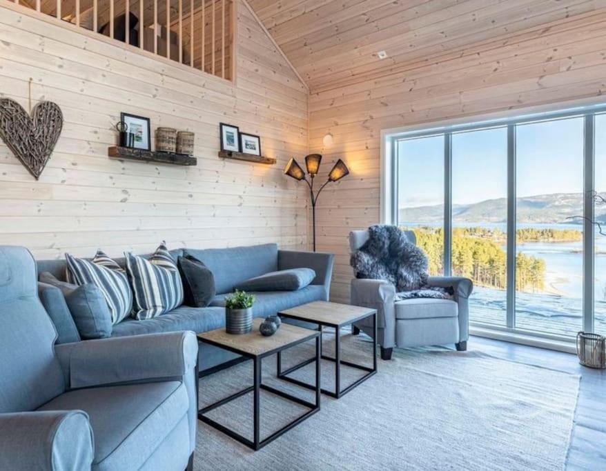 Modern cabin with panoramic view of the Nisser See