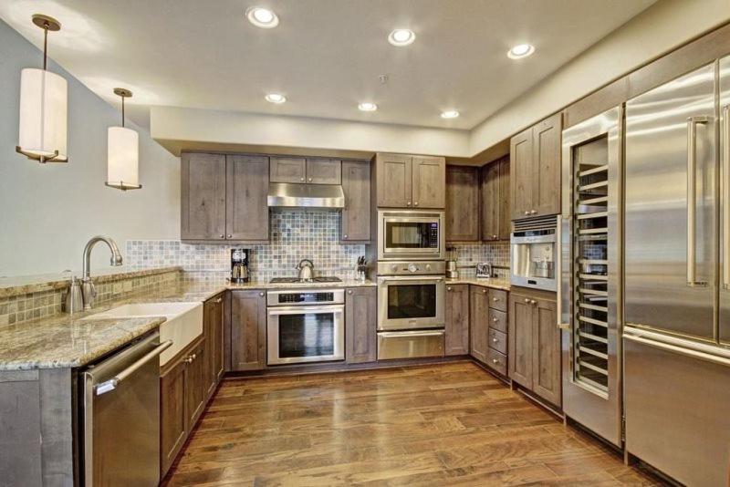 Expansive 4 Bedroom Ski In, Ski Out One Ski Hill Residence Located At The Base Of Peak 8 With Beautiful Views view 3