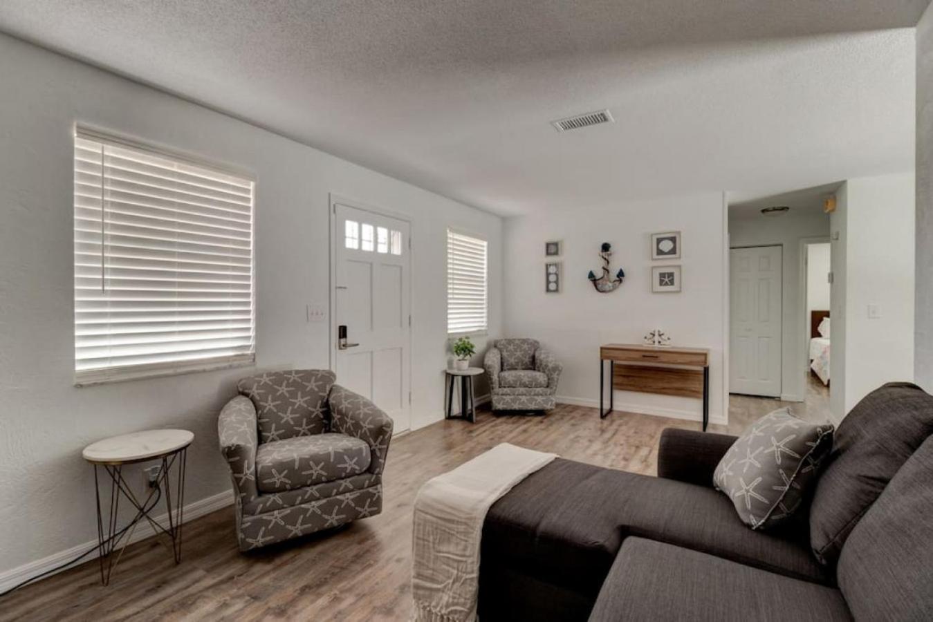 Coquina Cabana with fenced yard and adorable decor