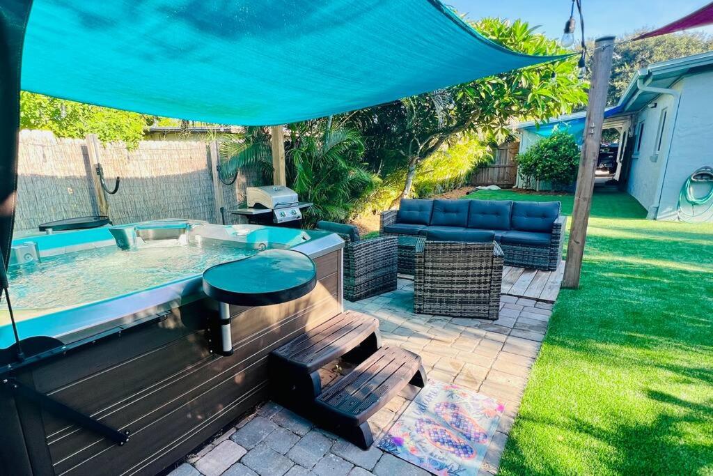 Luxury 2/2 private oasis w/Hot Tub walk to Beach view 3