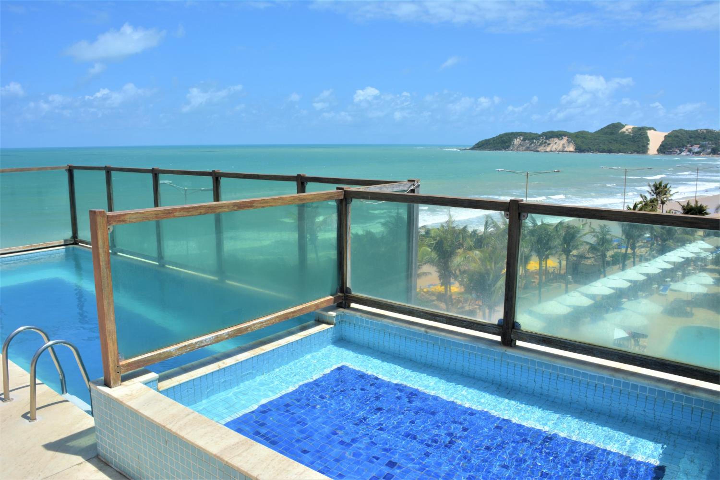 Na praia - Araça 406 Super Luxo - Lateral vista mar