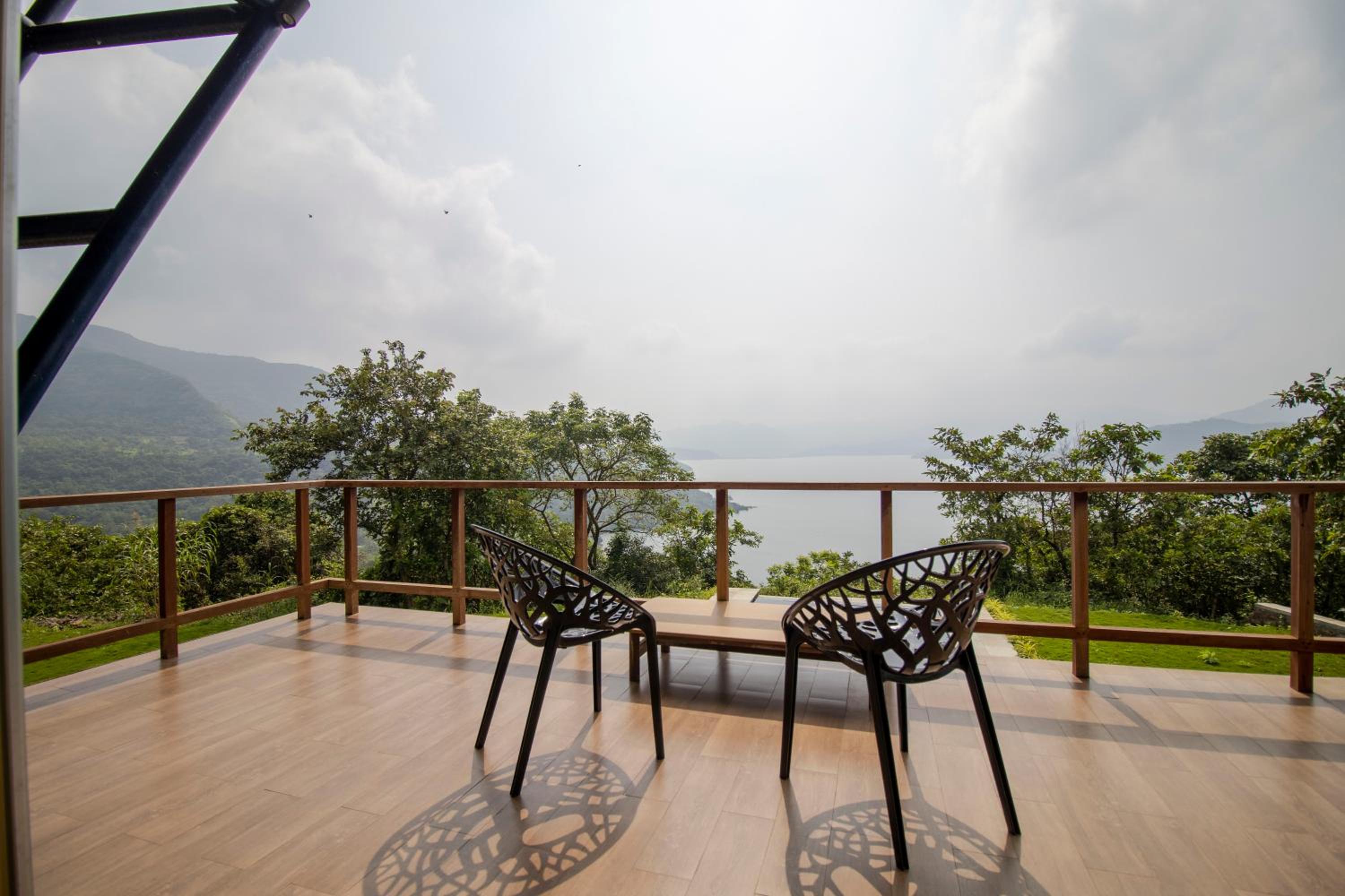 SaffronStays Solasta - 2BR luxury villa with black marble infinity pool, lotus pond & dam views in Mulshi view 2