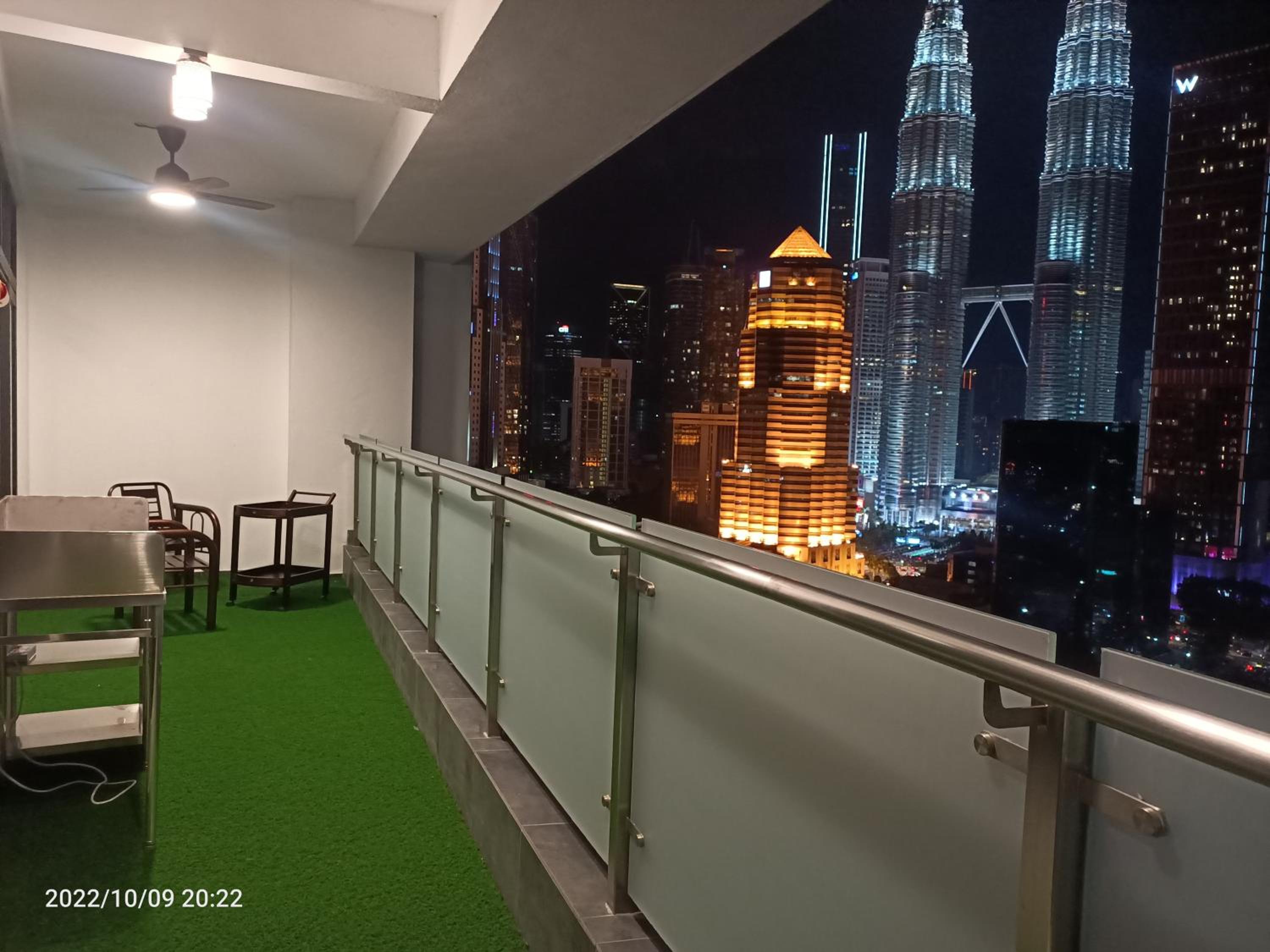 Legasi Kampung baru guest house by rumahrehat 1908sqft huge balcony for BBQ twin tower view