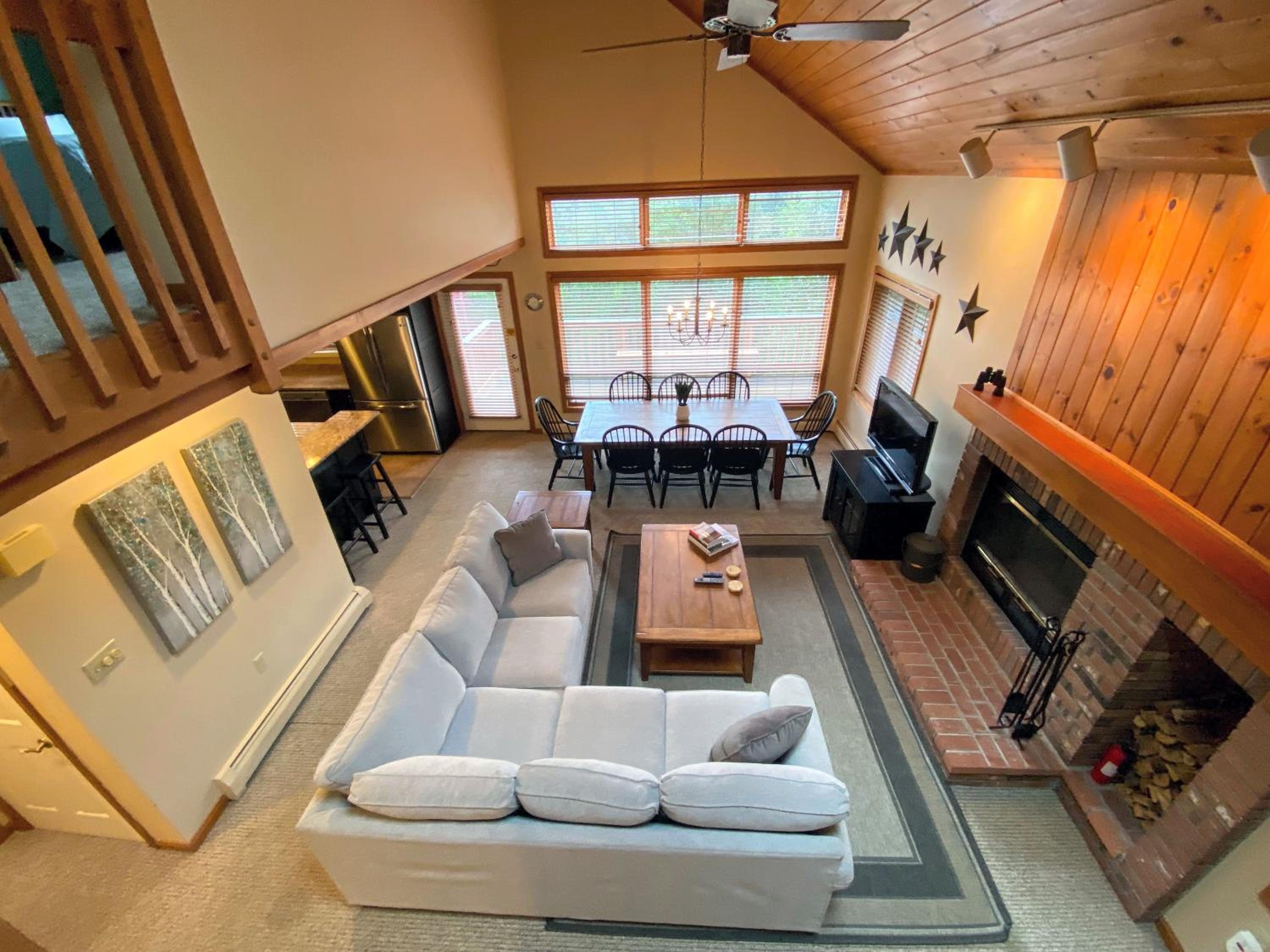 MWP59 Mount Wash Place Townhome fireplace large deck yard view 4