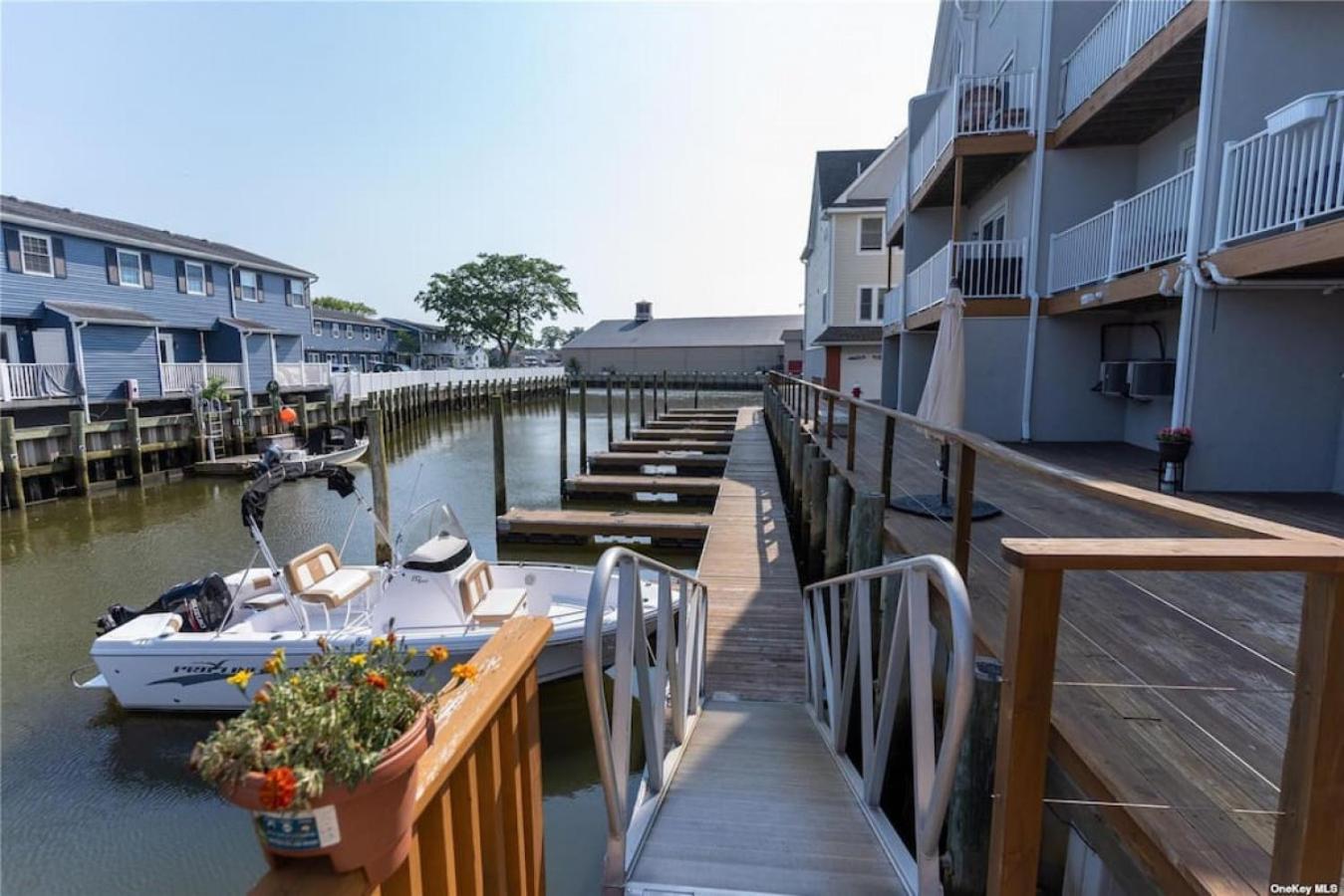 Yachtsman Cove Water Front 3 Bedrooms House Features 3 Levels Living Space in Freeport NY view 2