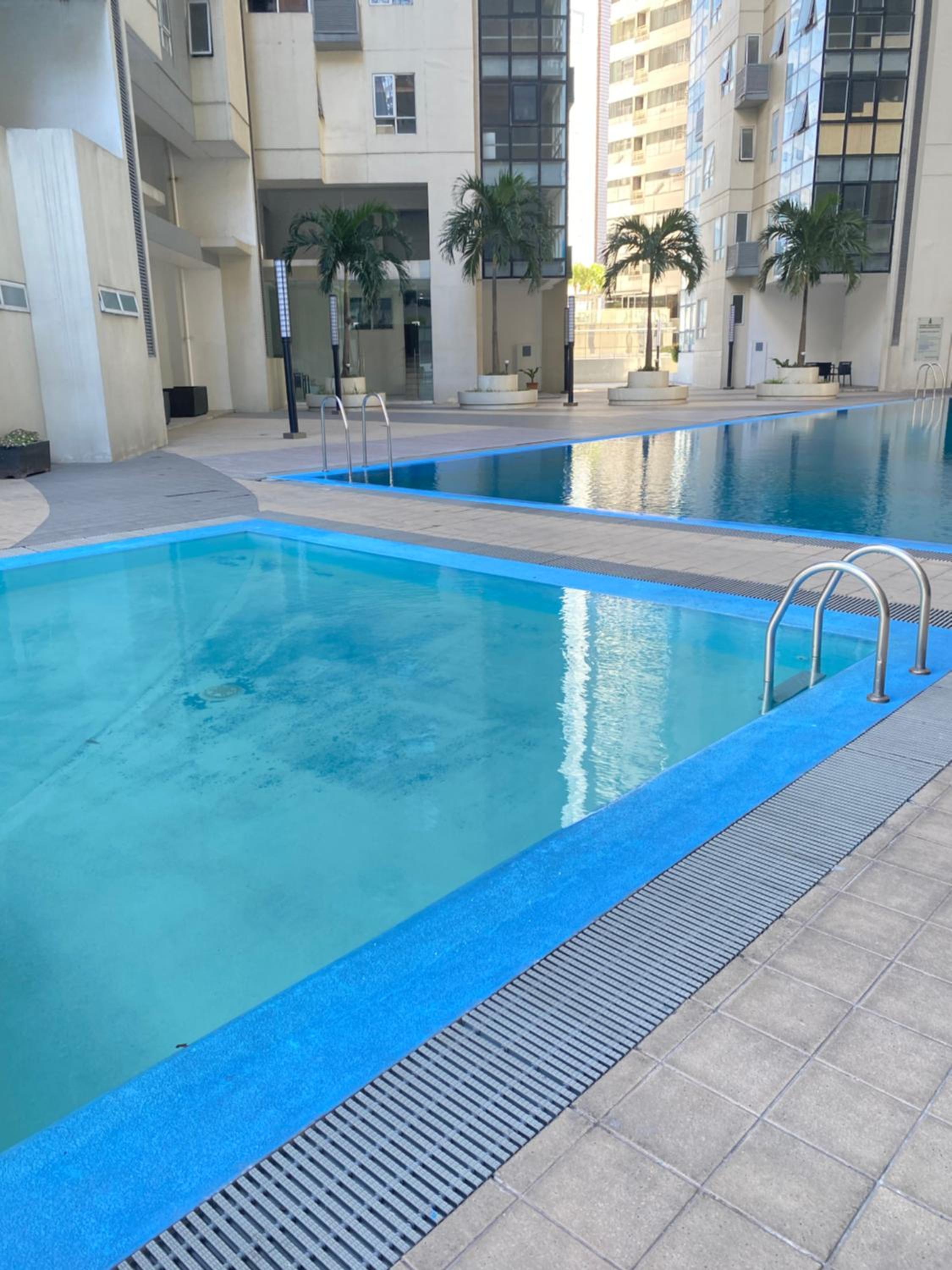 Comfy and Cozy 2BR Condo in BGC with WiFi and Netflix view 3