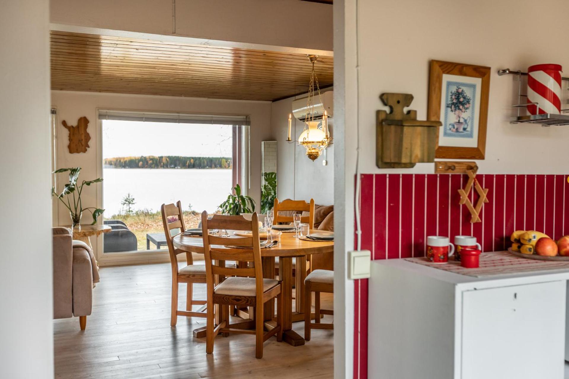 Lapland Sunrise Cottage with lakefront Sauna view 5