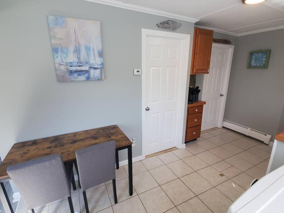 Beachy Bay Breeze Bungalow 2BR with parking and close to many amenities.