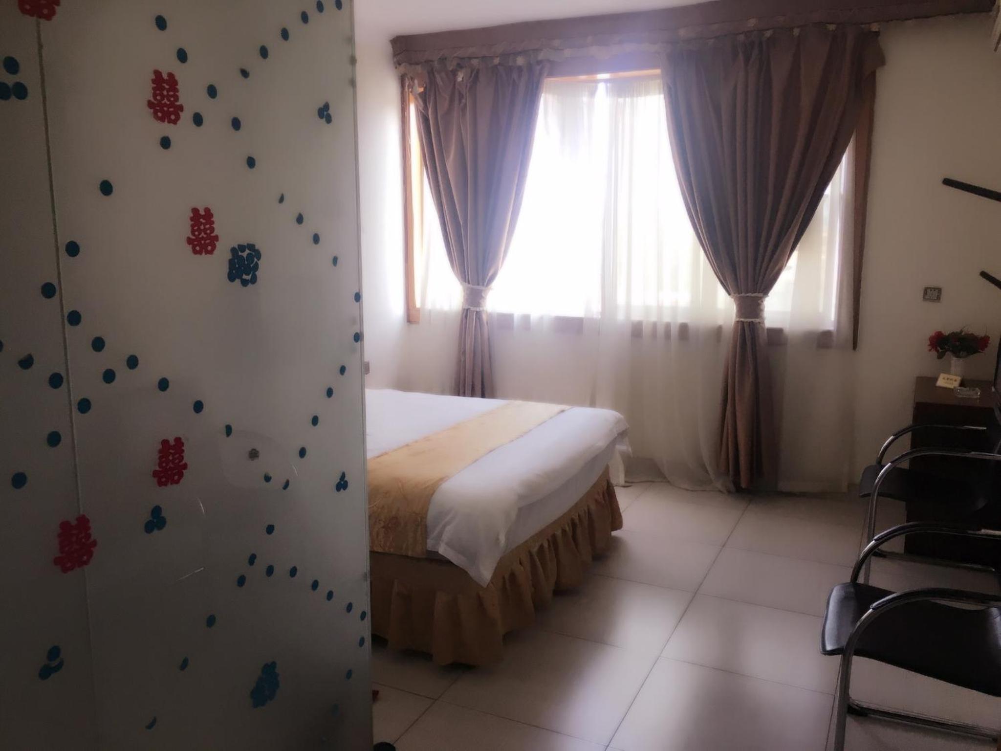Shengtang Business Hotel