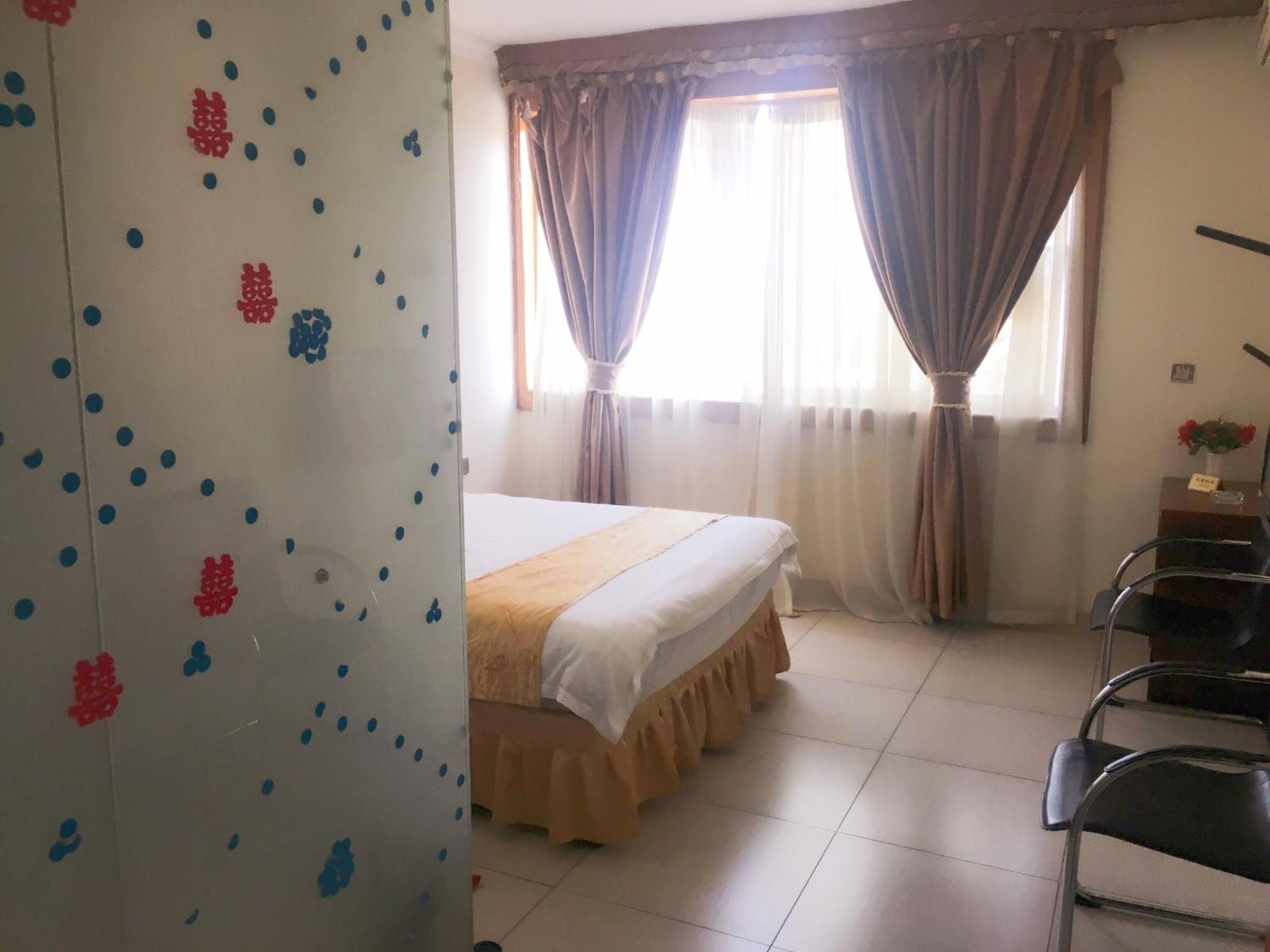 Shengtang Business Hotel