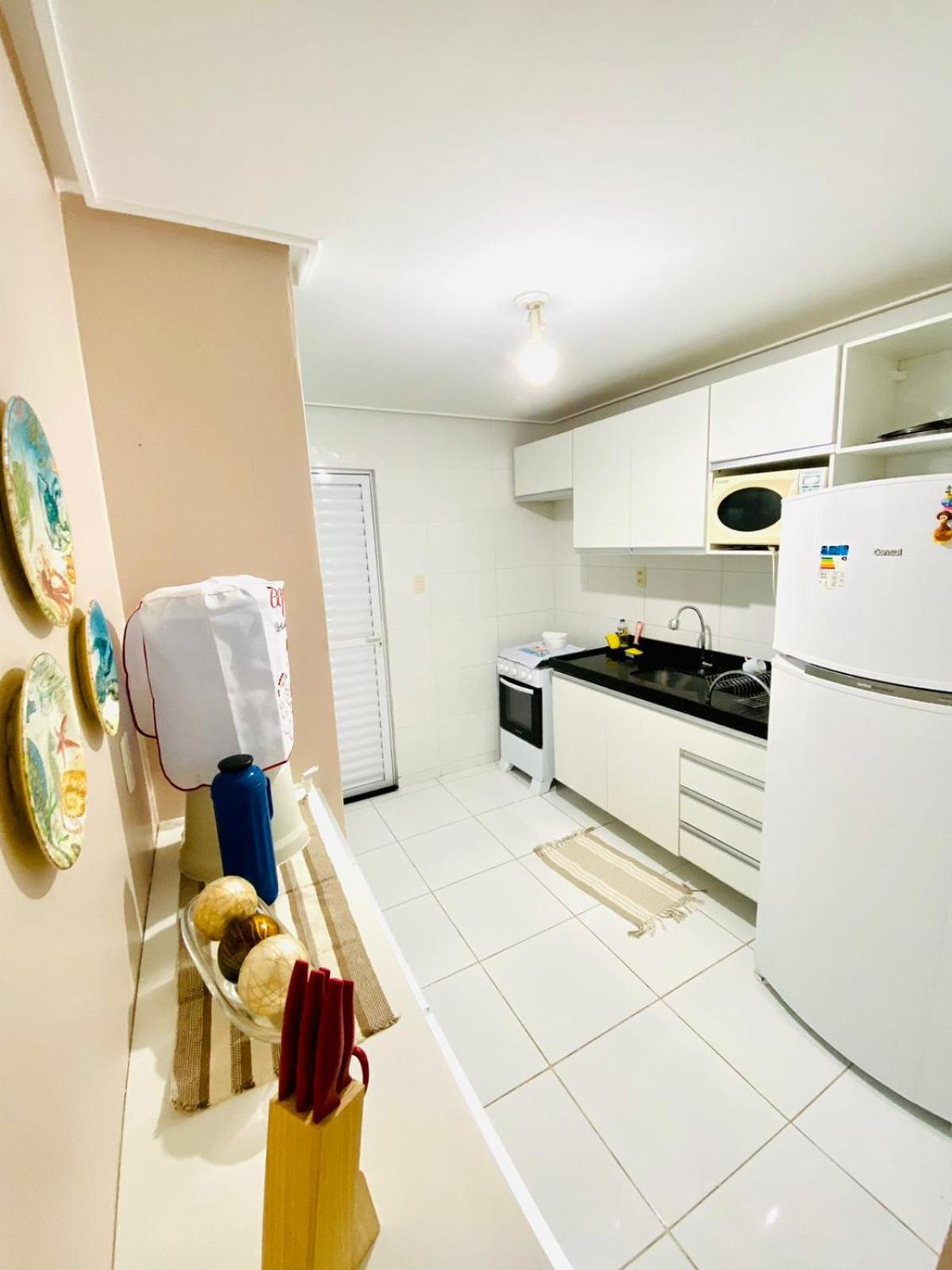 Apartamento encantador térreo em condomínio fechad