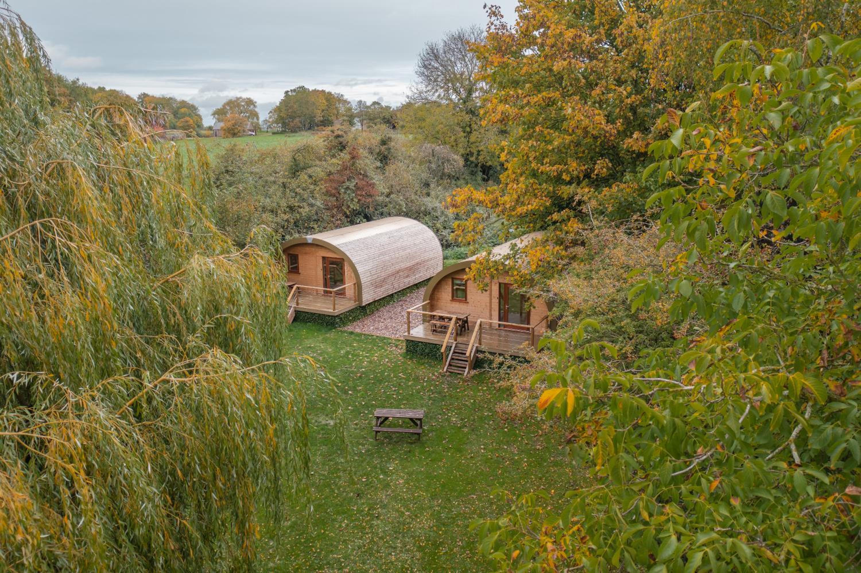 Cosy and eco-friendly cabins next to 16th century pub view 2