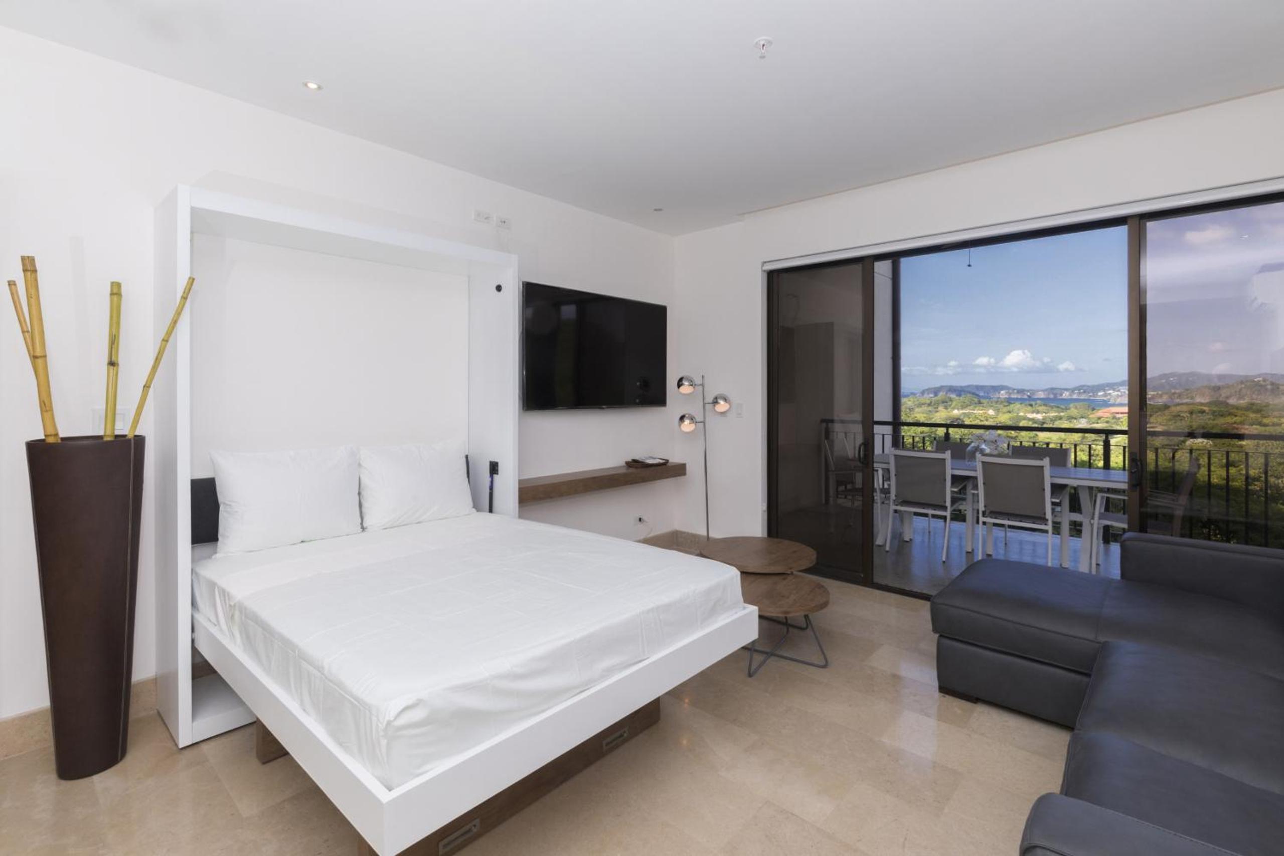 Modern 2BR Condo Partial Ocean View - Roble Sabana - Reserva Conchal Golf Resort