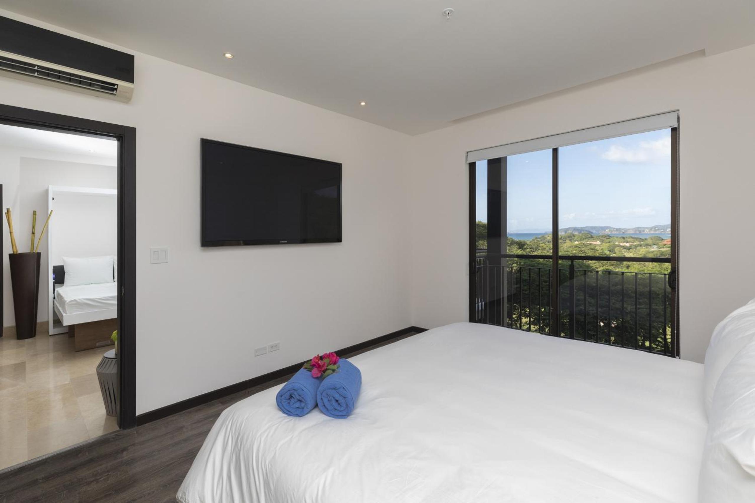 Modern 2BR Condo Partial Ocean View - Roble Sabana - Reserva Conchal Golf Resort