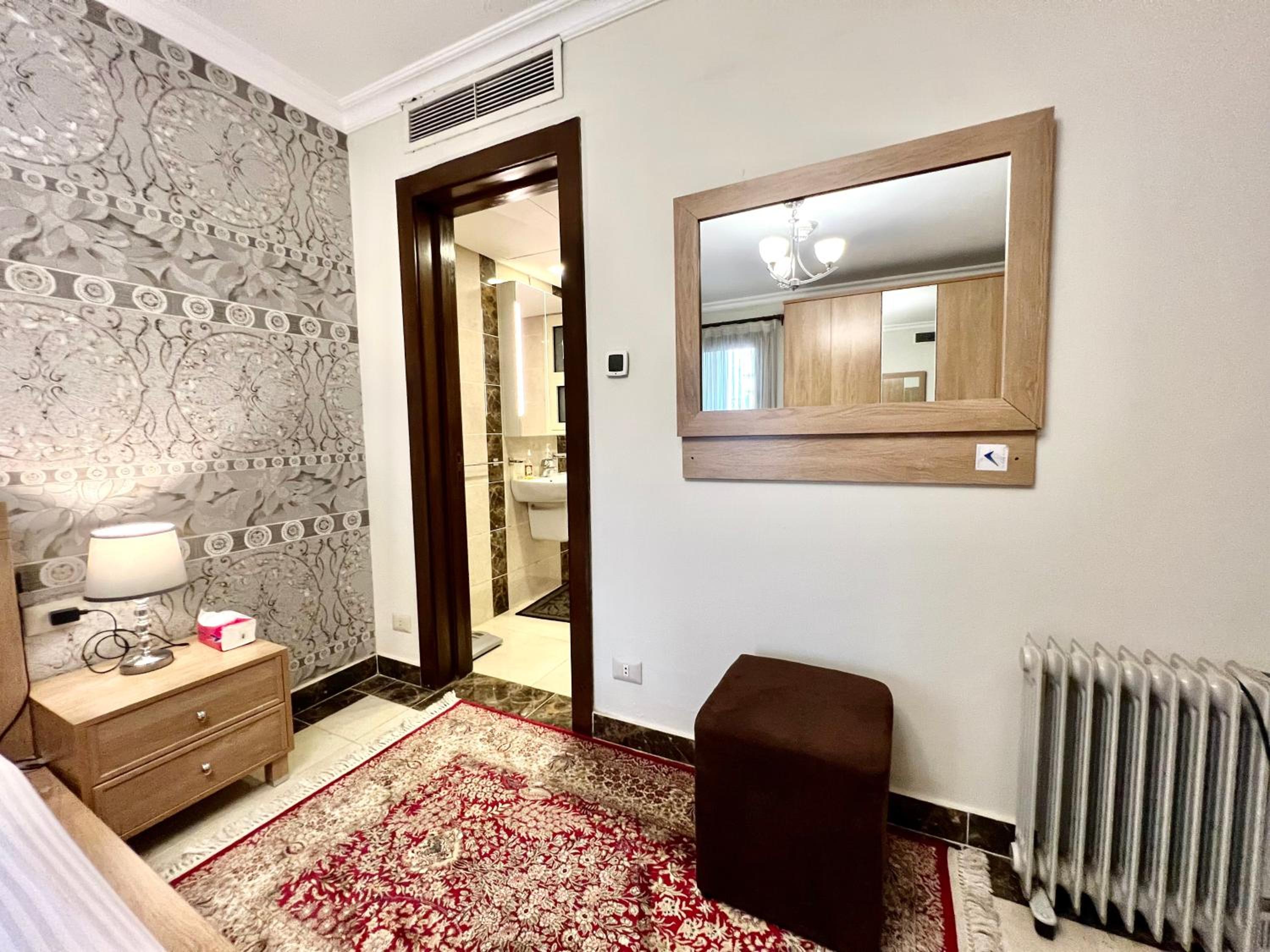 Luxury hotel apartment with pools in front AUC
