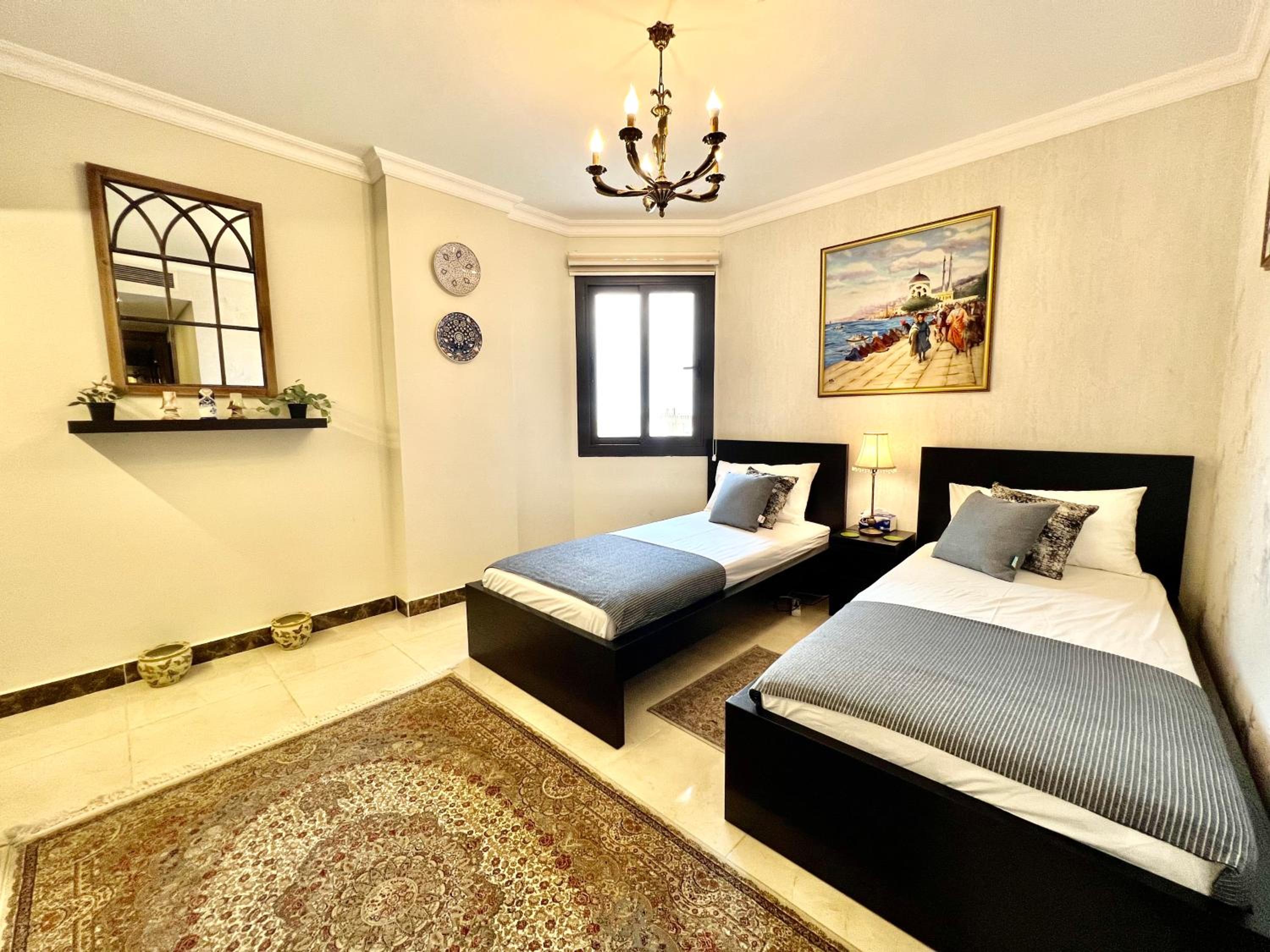 Luxury hotel apartment with pools in front AUC