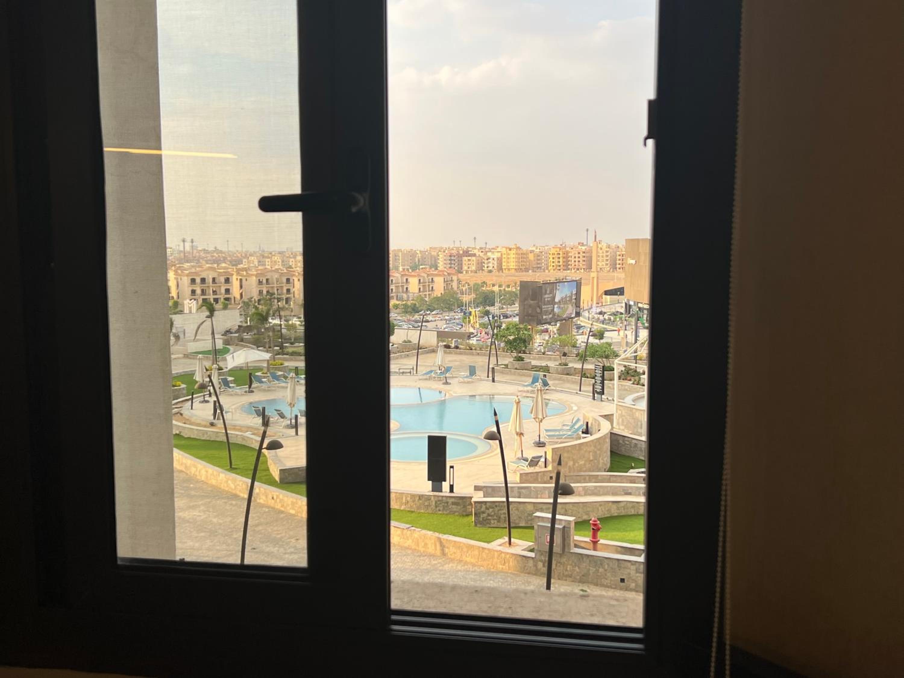 Luxury hotel apartment with pools in front AUC