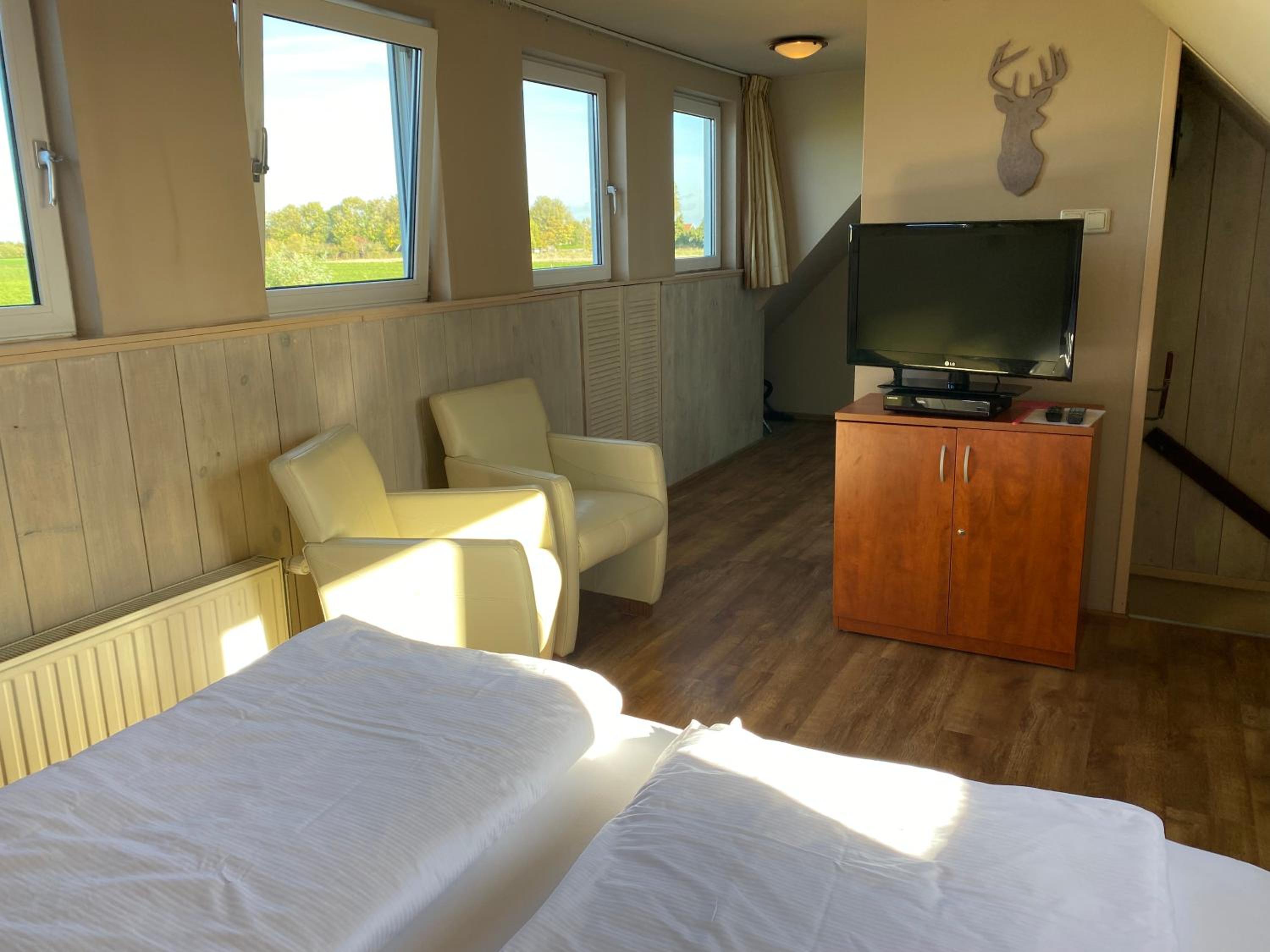 T Huuske tuinappartement met fantastisch uitzicht, nabij Zee view 5