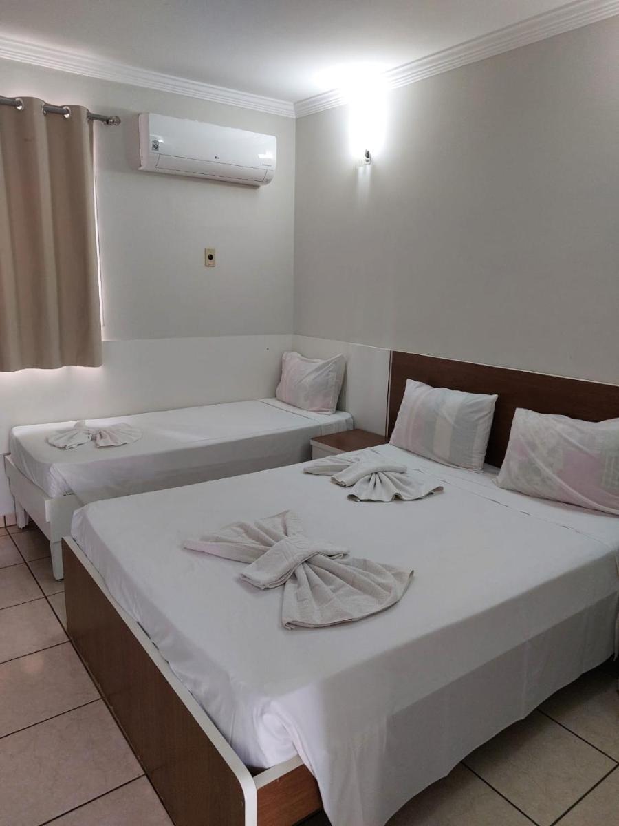 diRoma Fiori 89 com roupa de cama e banho.