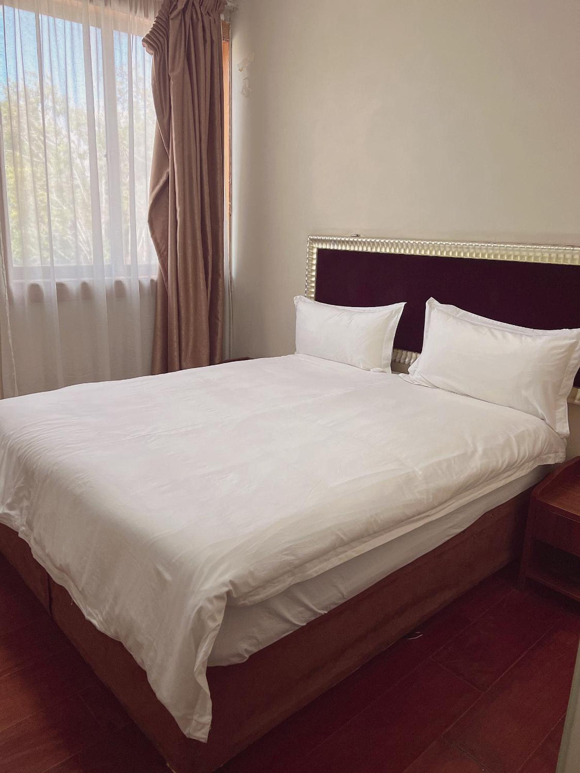 Shengtang Business Hotel