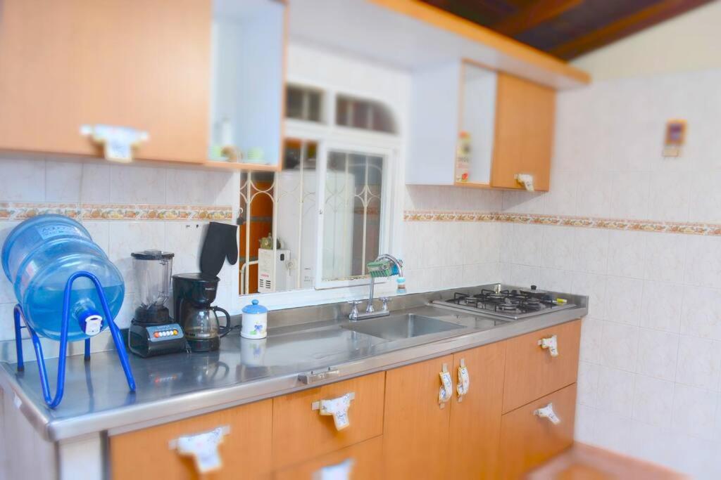 Casa familiar y agradable, parqueadero y BBQ